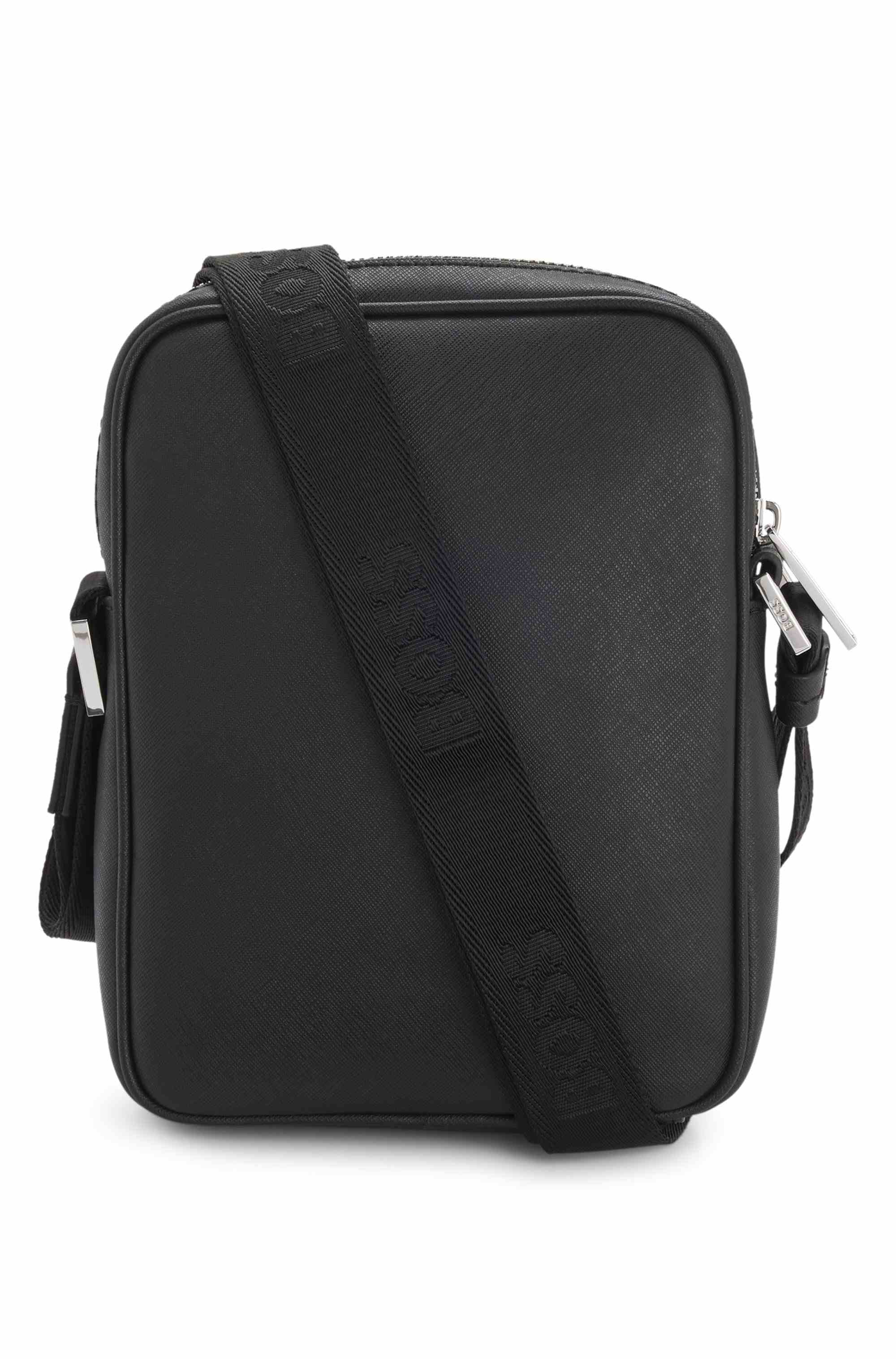 Reporter bag with signature stripe and logo detail
