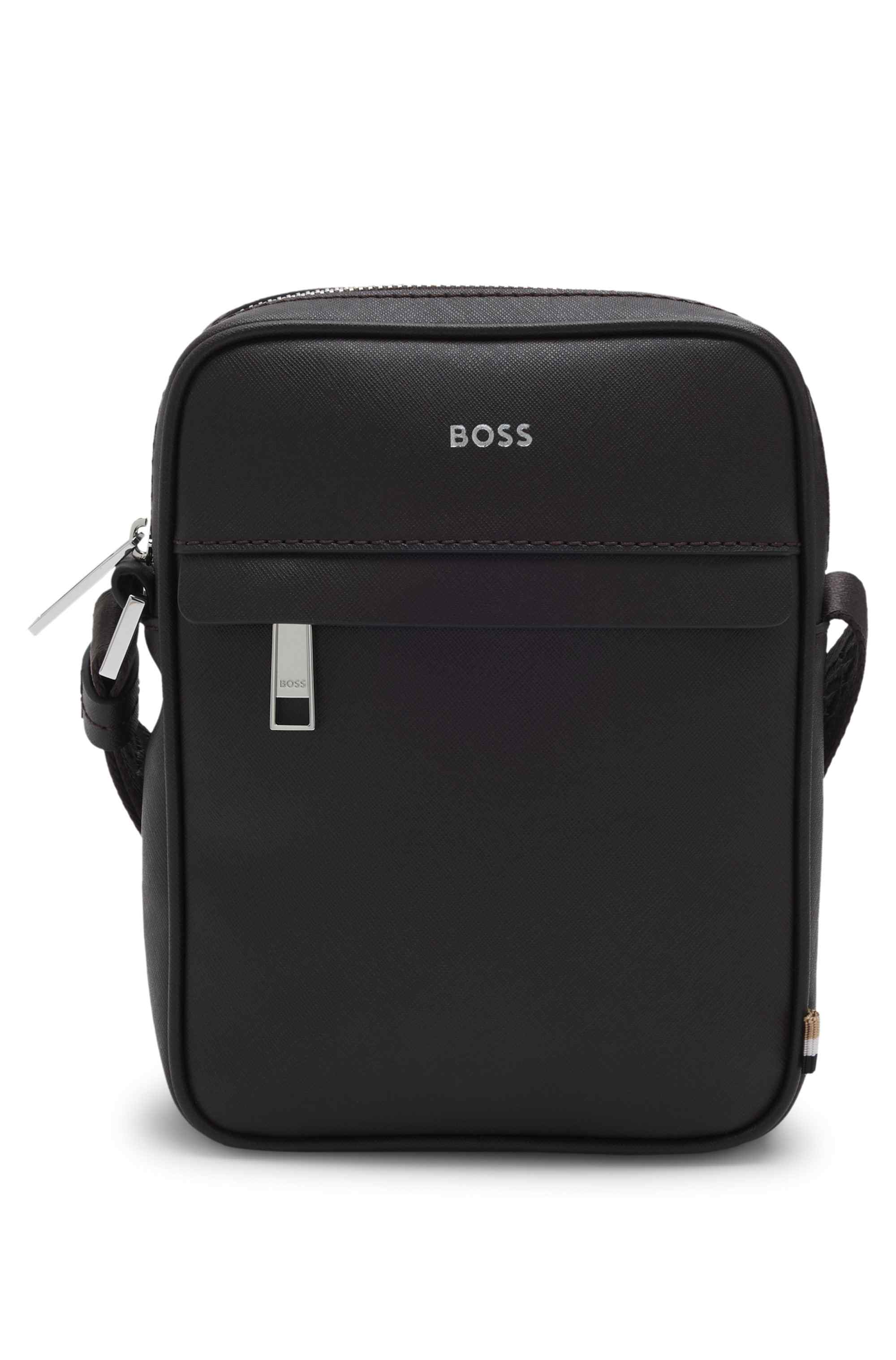 Reporter bag with signature stripe and logo detail