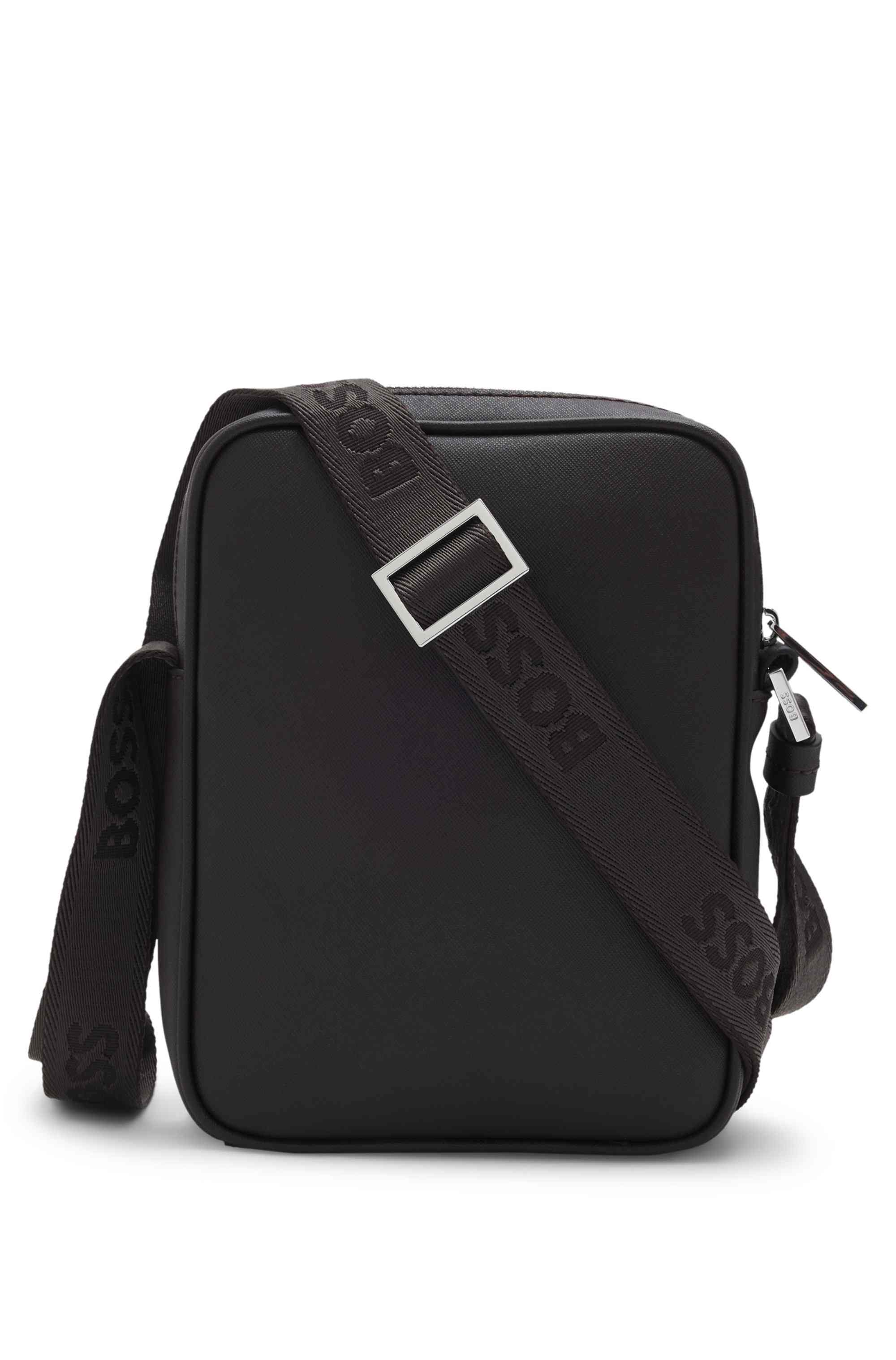 Reporter bag with signature stripe and logo detail