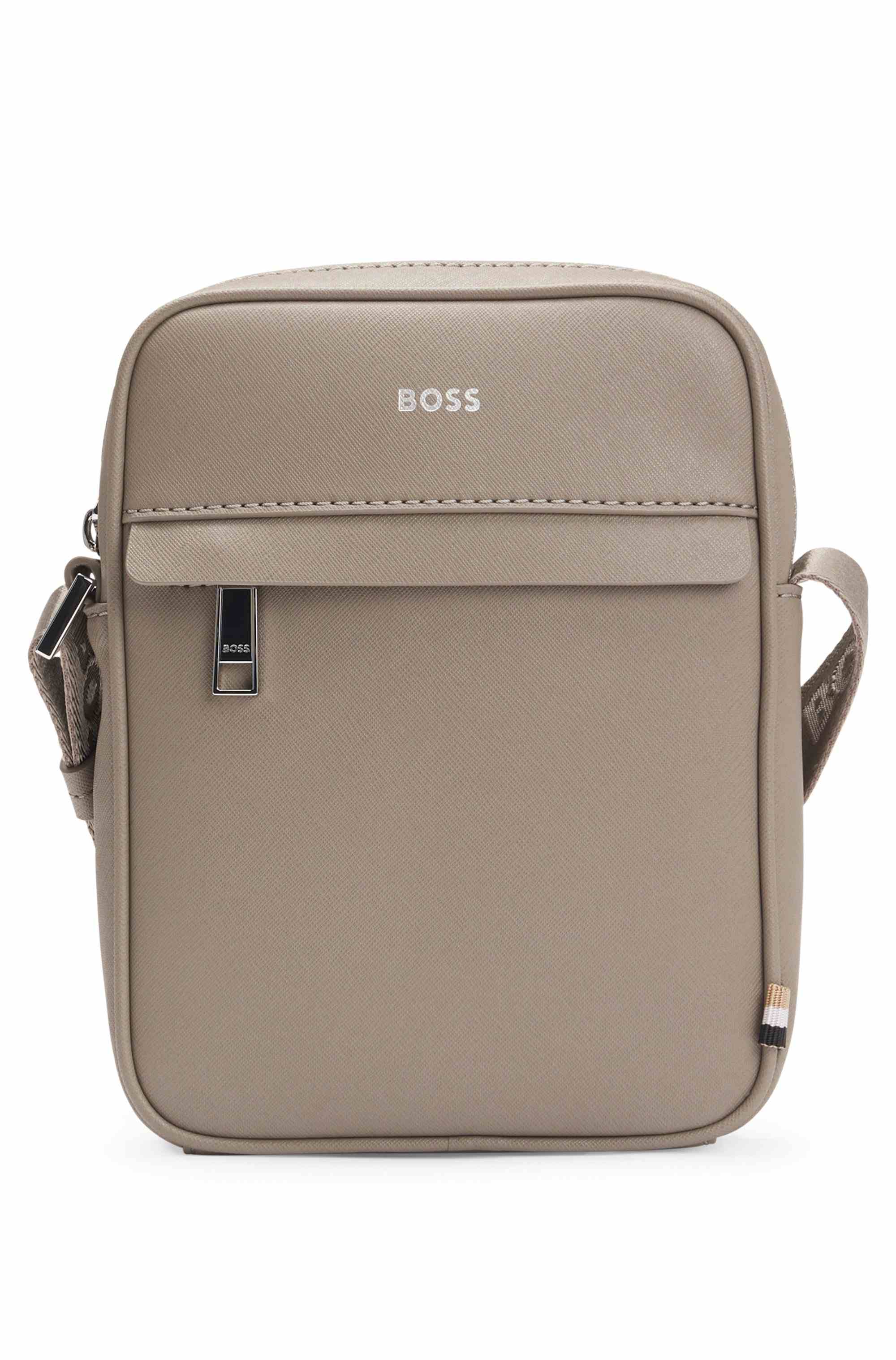 Reporter bag with signature stripe and logo detail