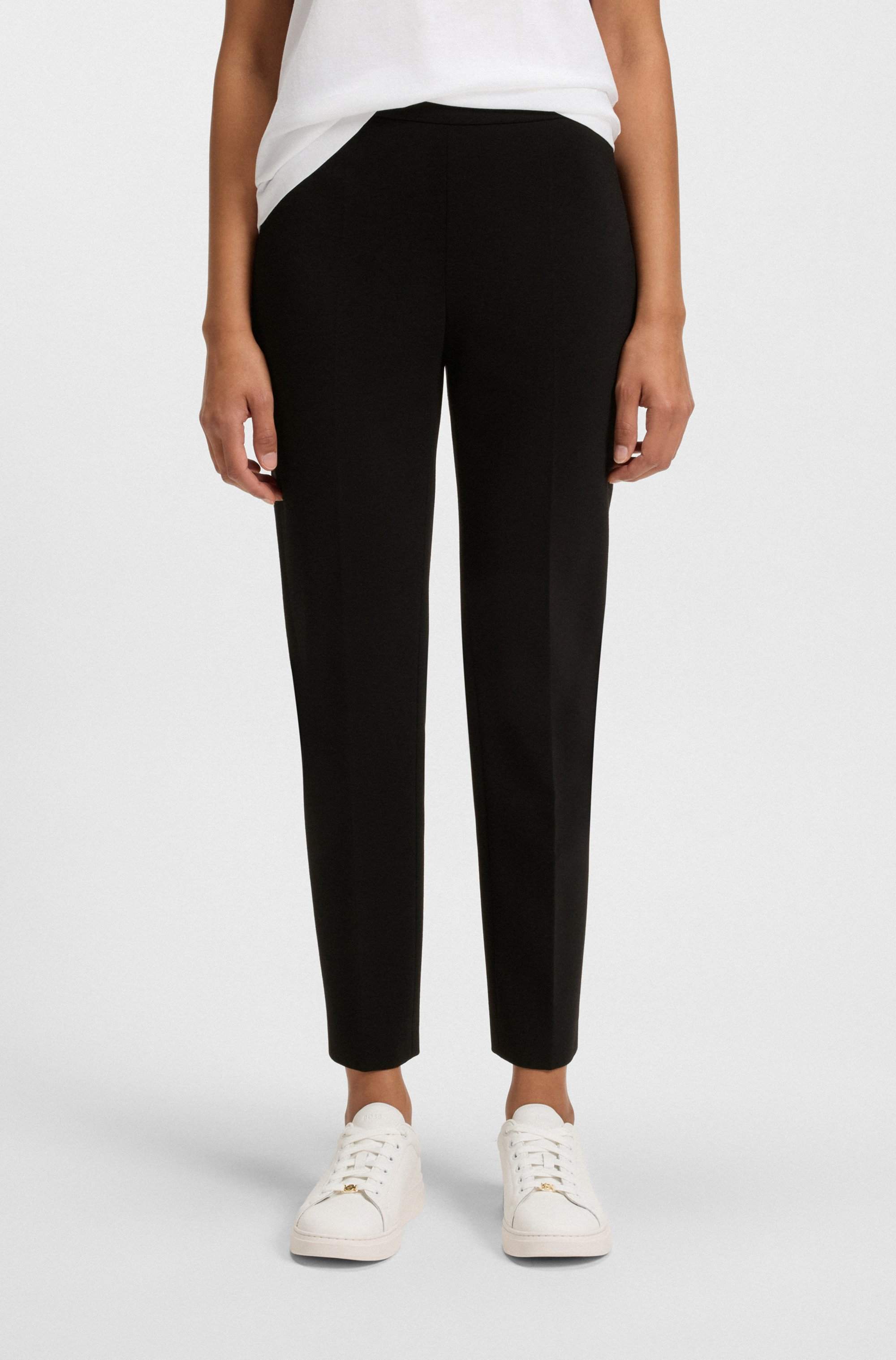 Regular-fit trousers in stretch fabric with tapered leg