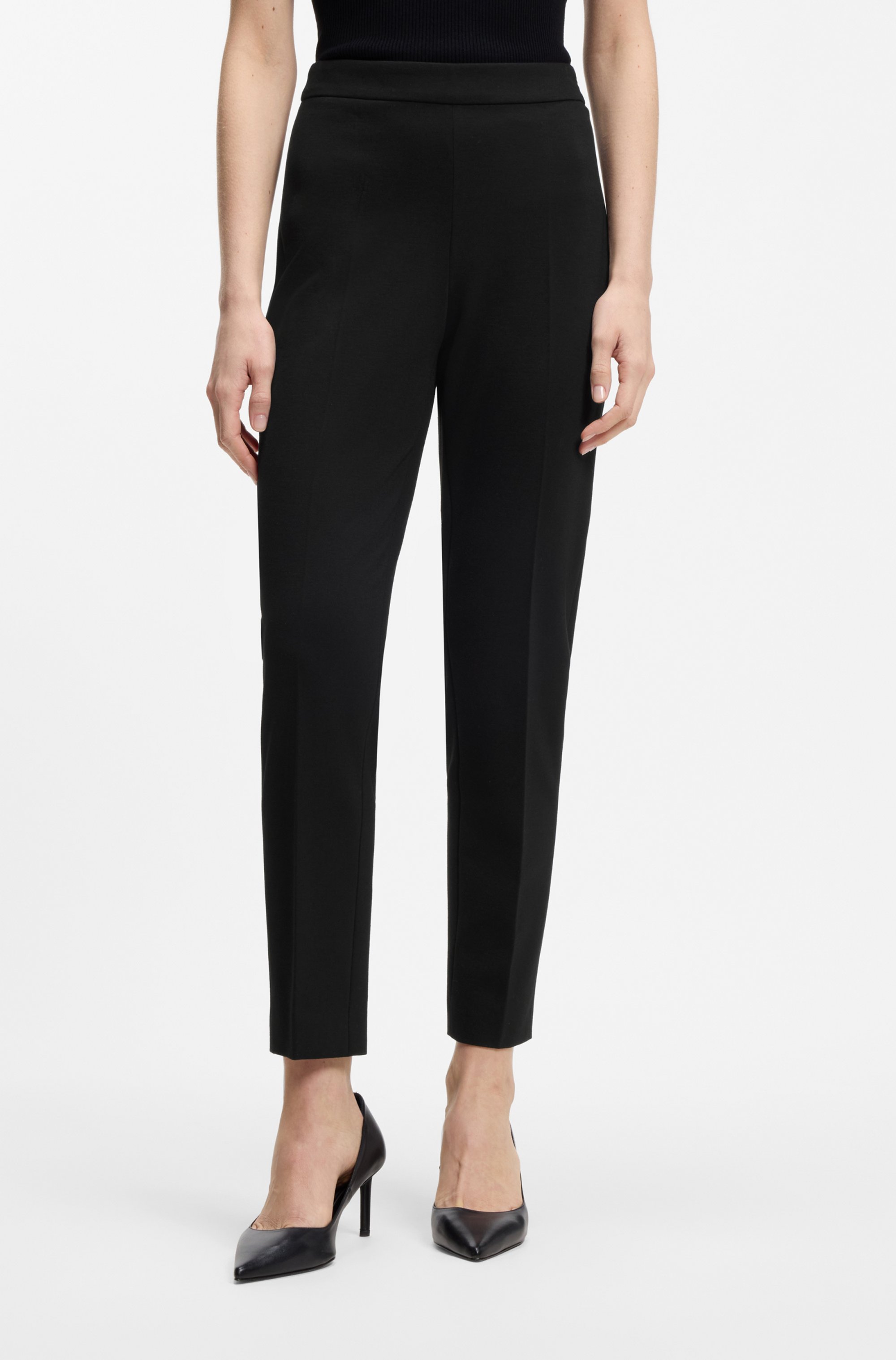 Regular-fit trousers in stretch fabric with tapered leg