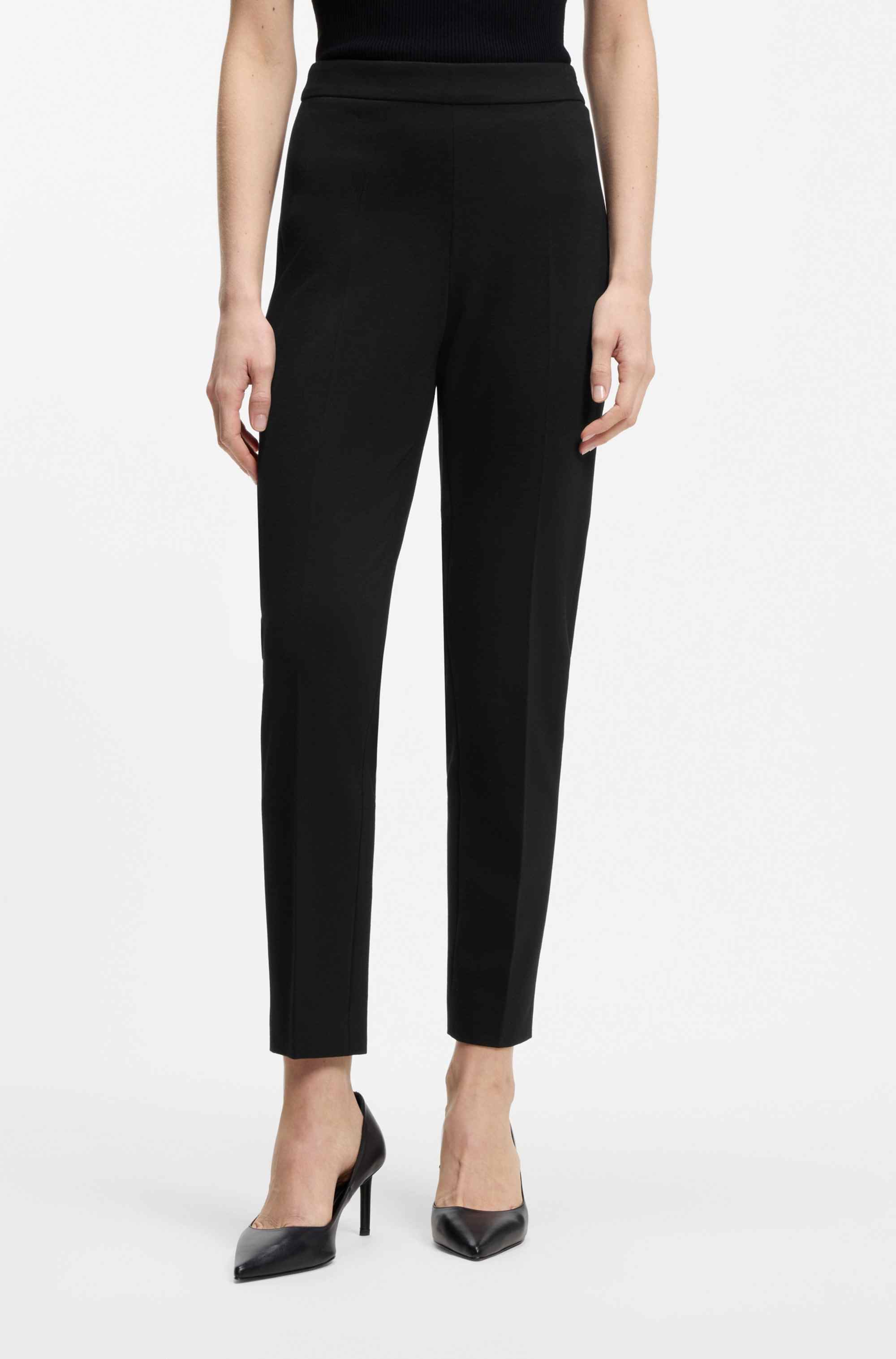 Regular-fit trousers in stretch fabric with tapered leg