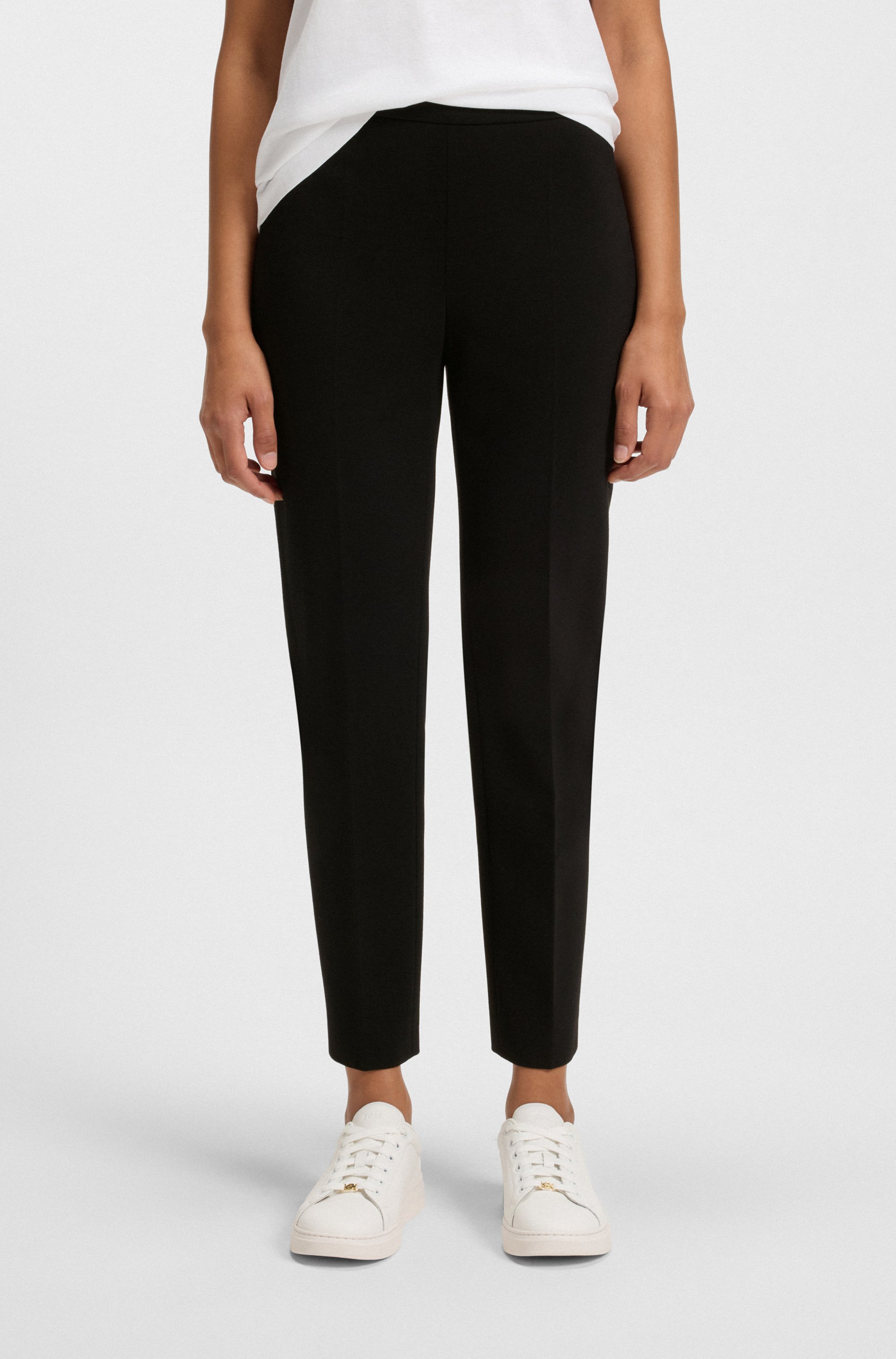 Regular-fit trousers in stretch fabric with tapered leg