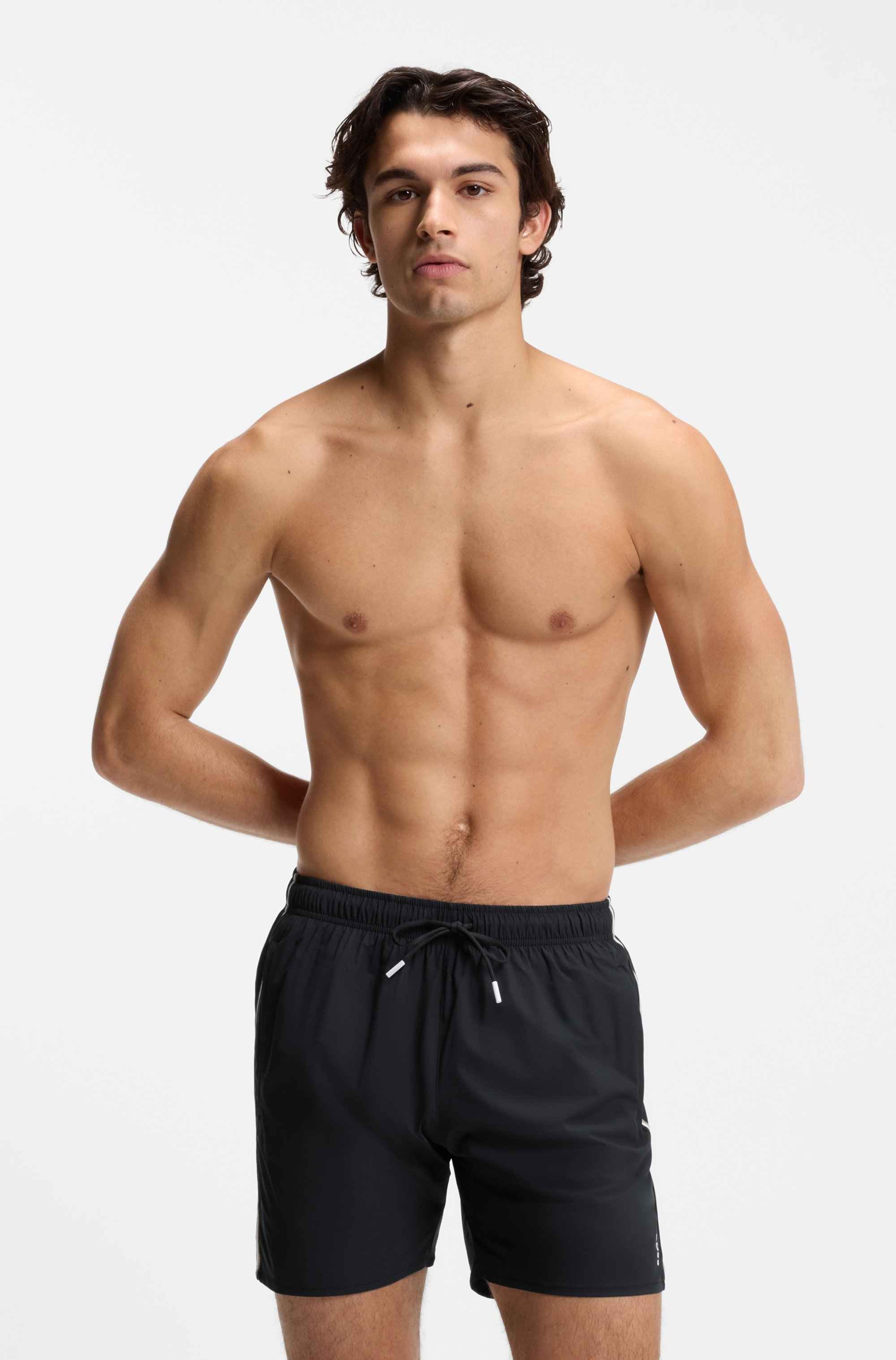 Swim shorts with signature stripe and logo