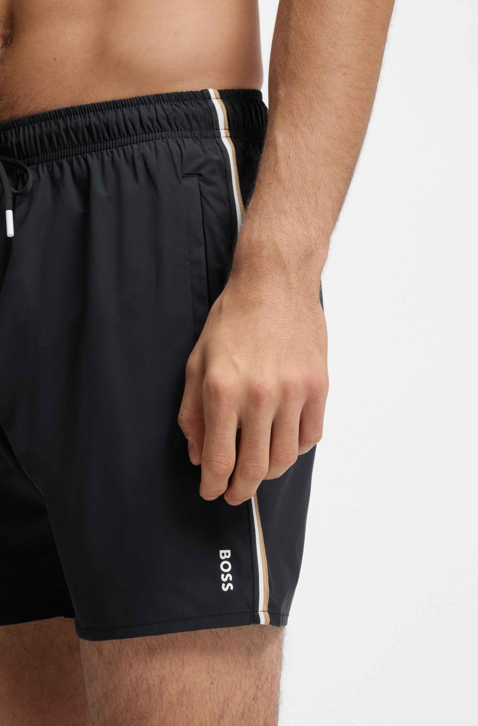 Swim shorts with signature stripe and logo