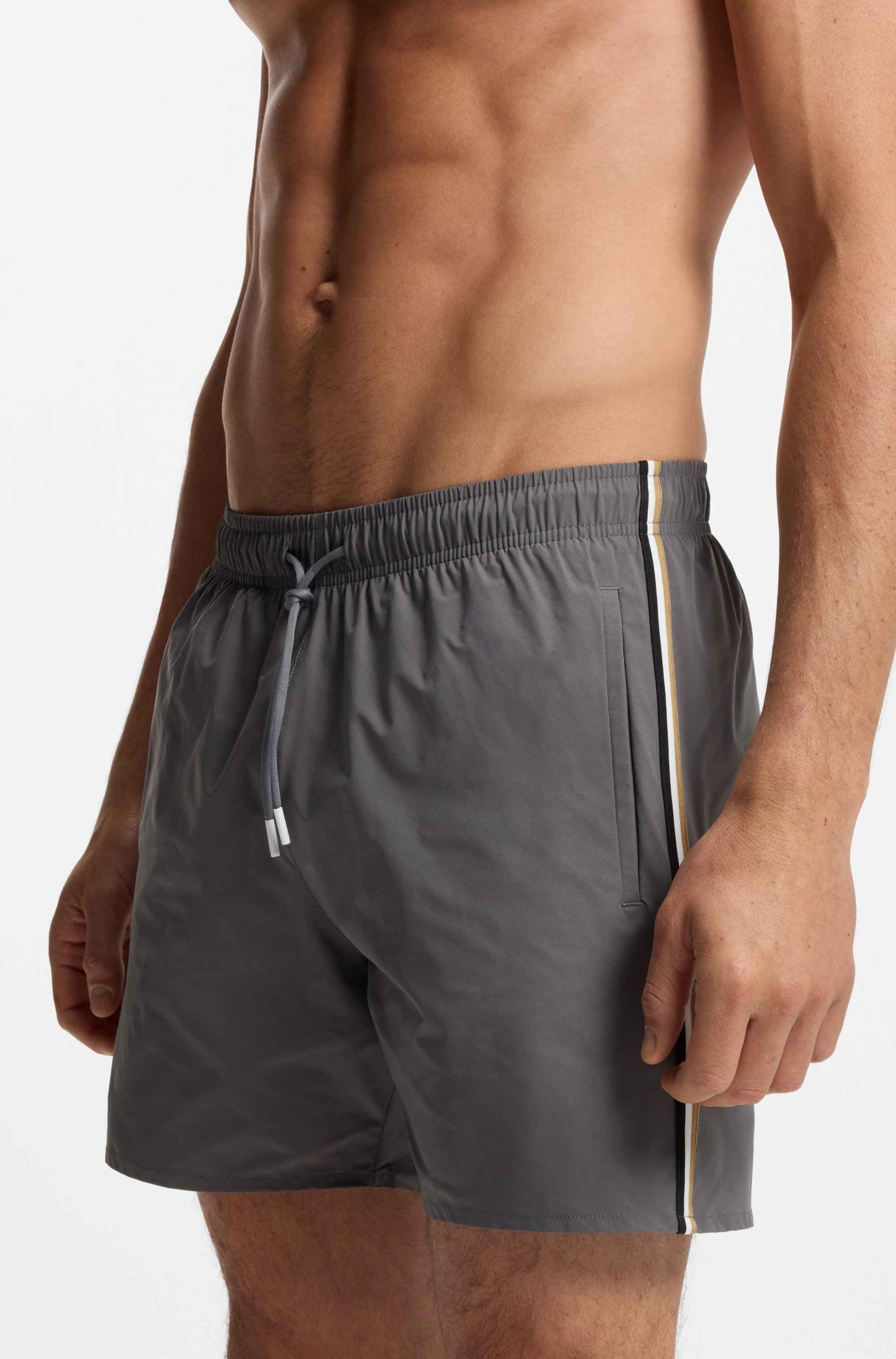 Swim shorts with signature stripe and logo