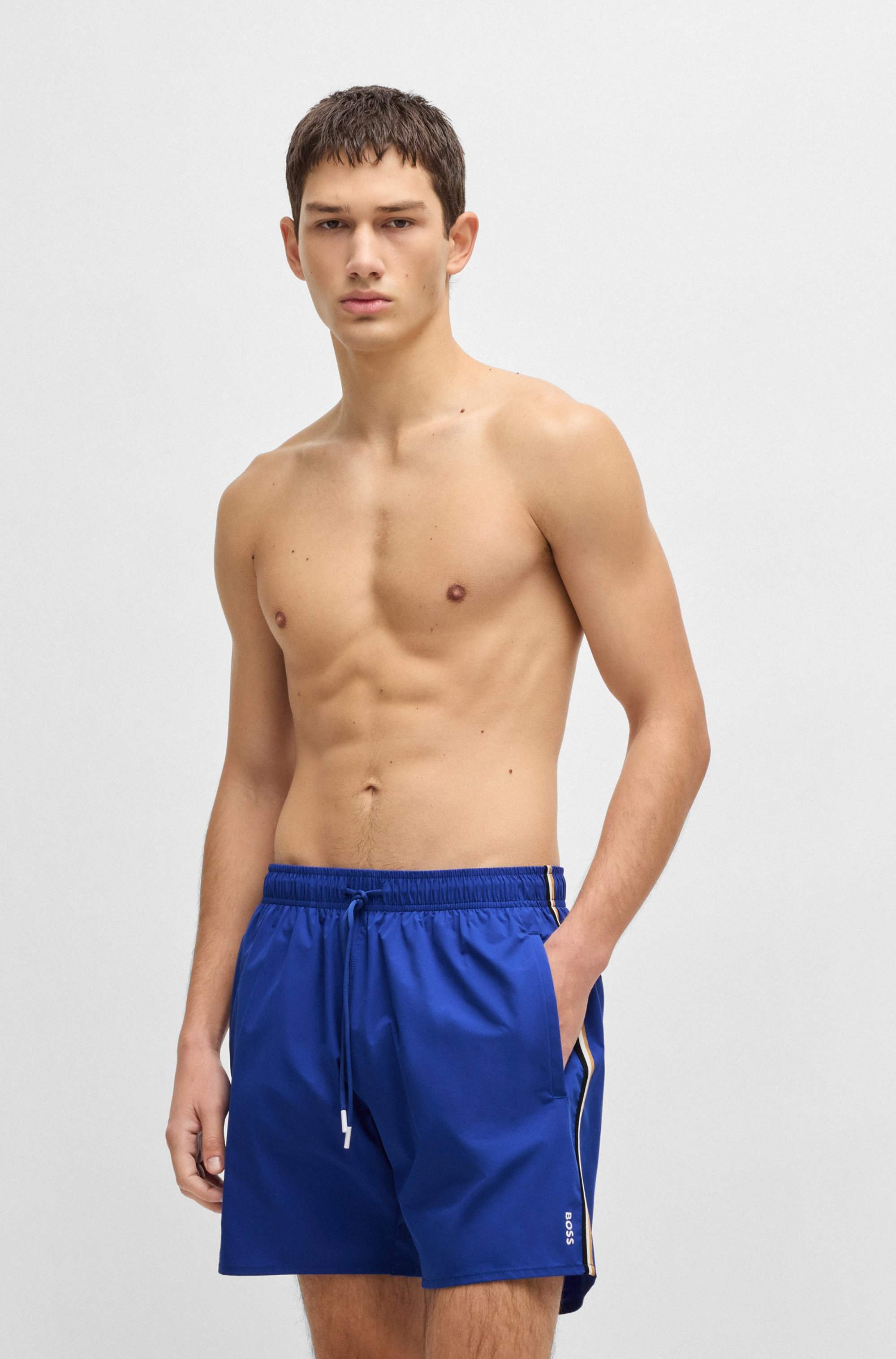 Swim shorts with signature stripe and logo