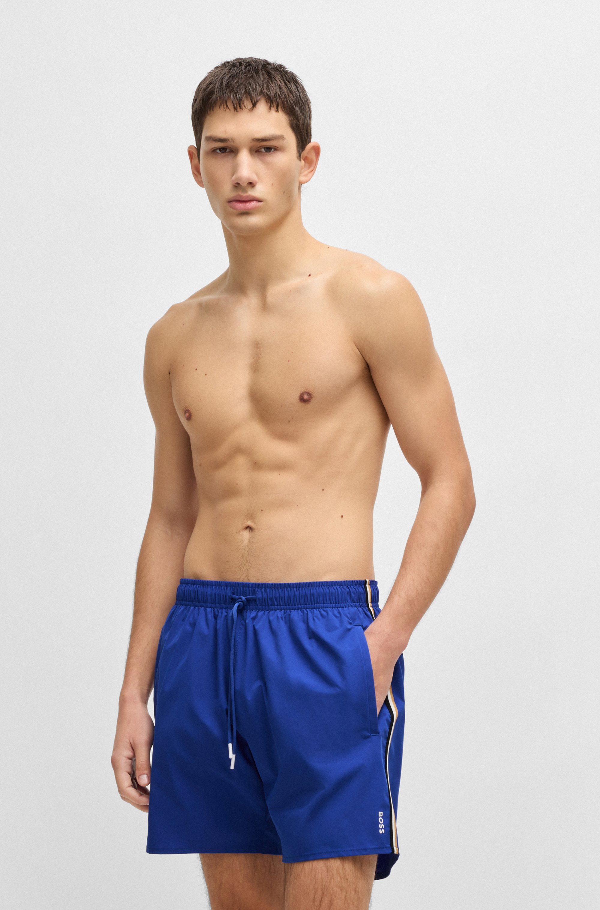 Swim shorts with signature stripe and logo