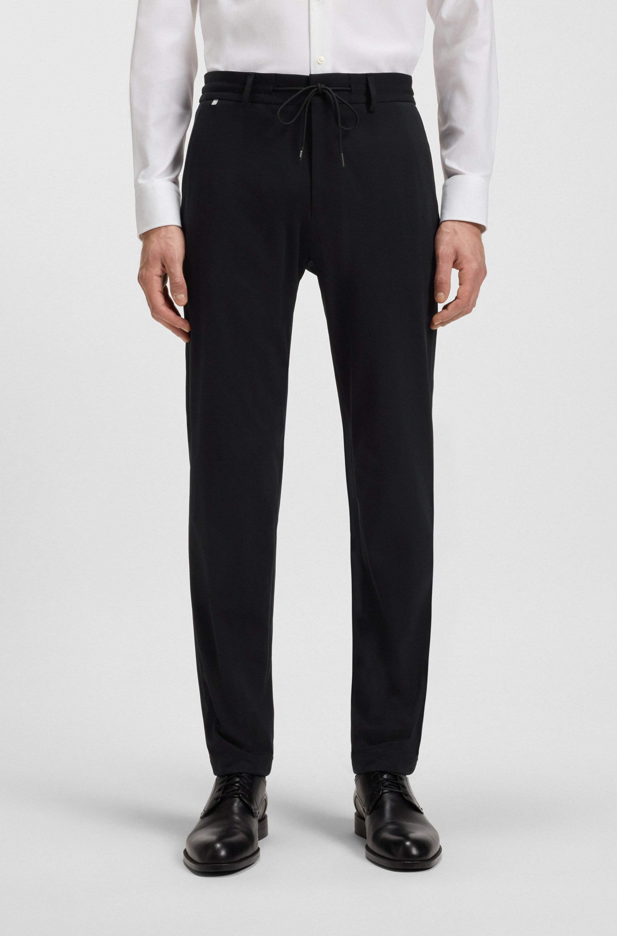 Slim-fit trousers in performance-stretch jersey