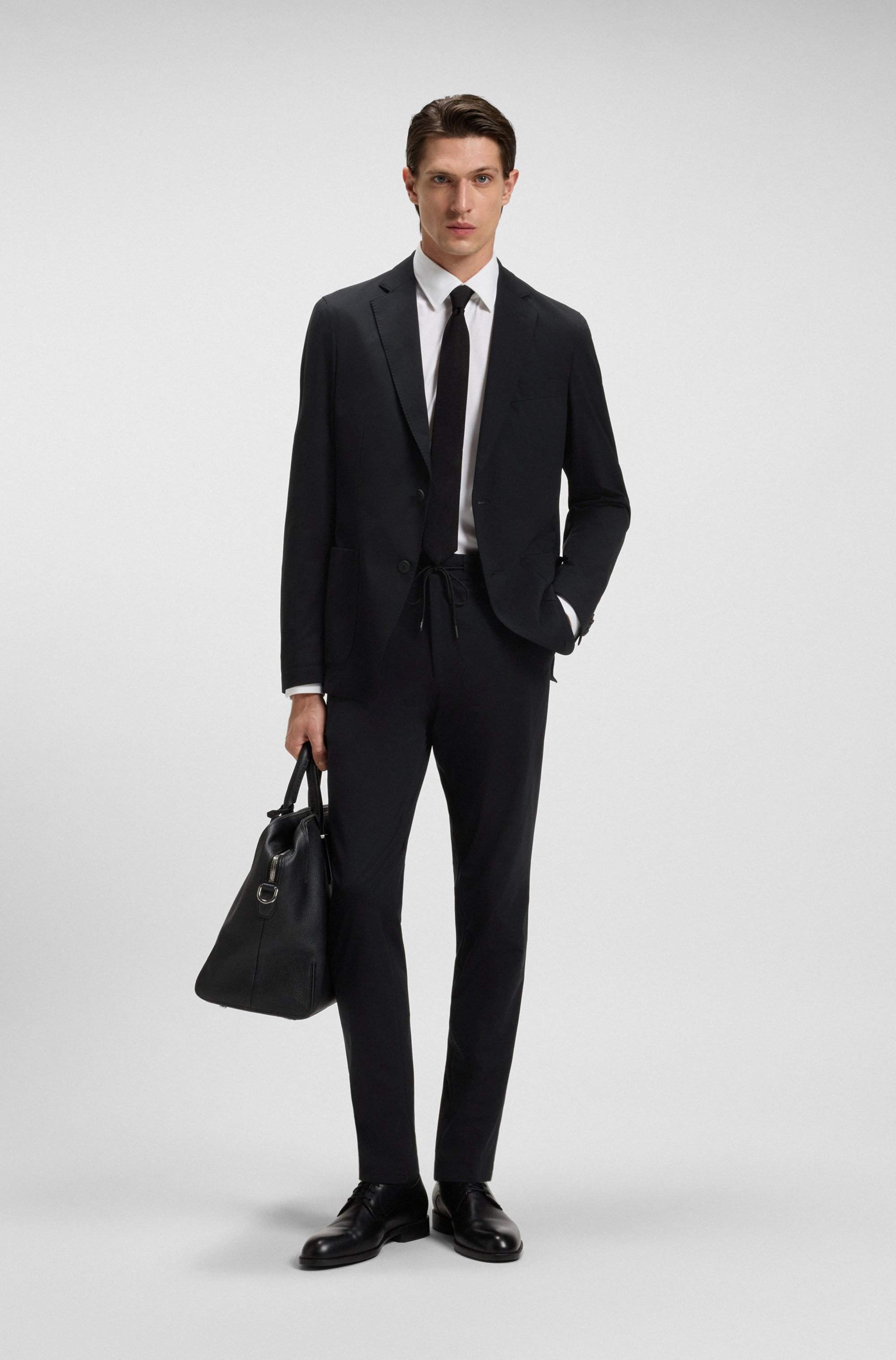 Slim-fit trousers in performance-stretch jersey