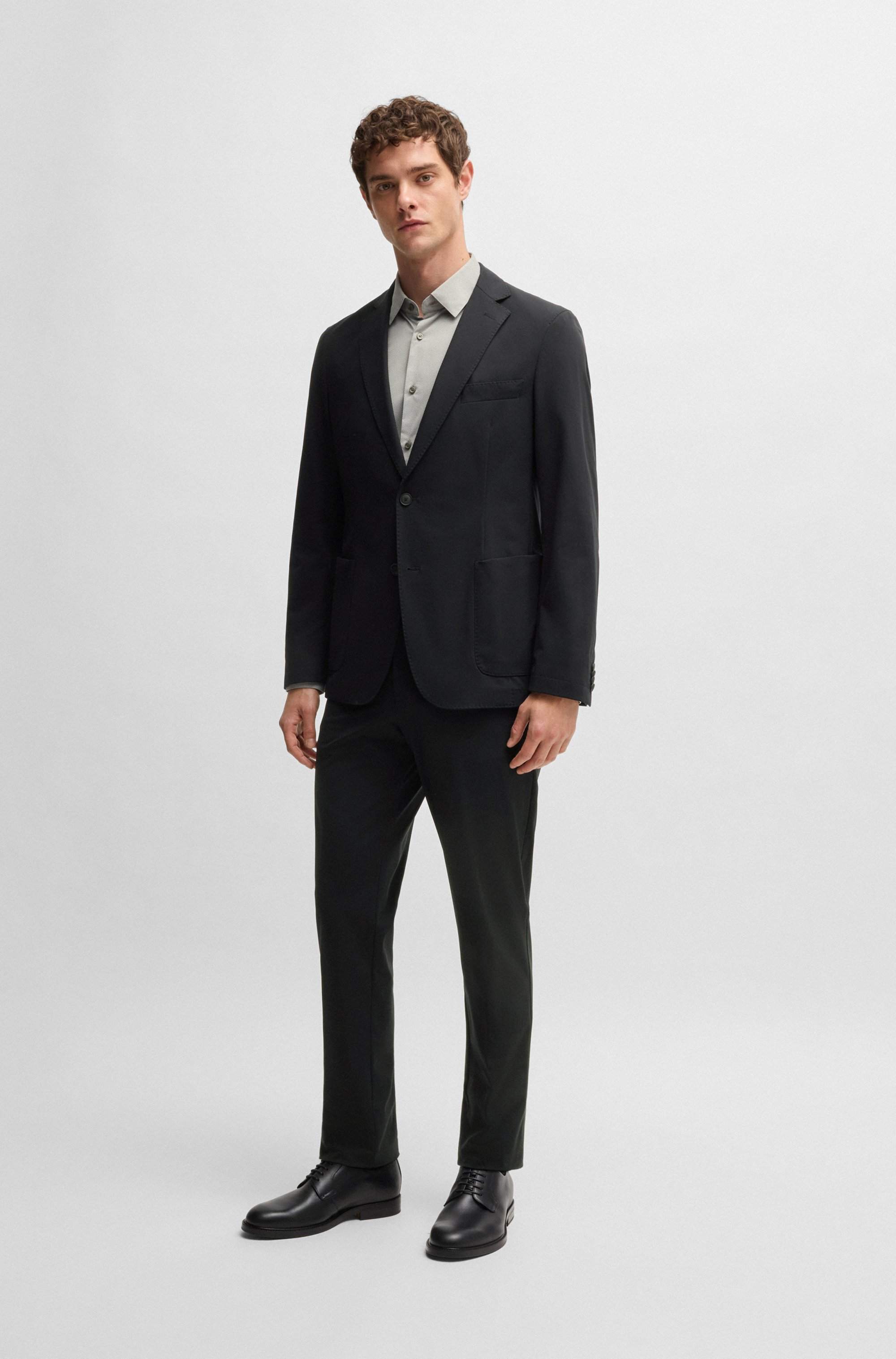 Slim-fit trousers in performance-stretch jersey
