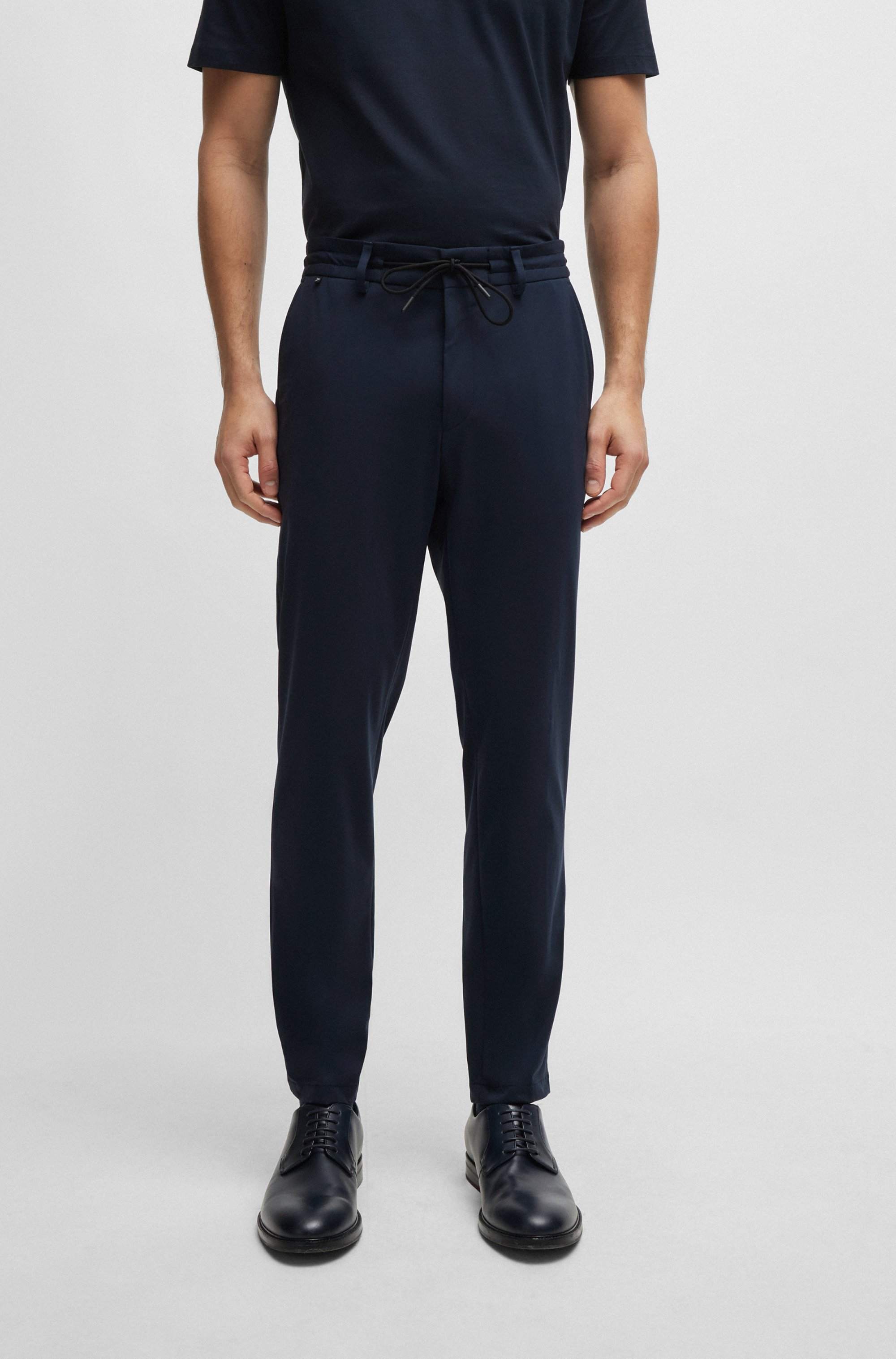 Slim-fit trousers in performance-stretch jersey