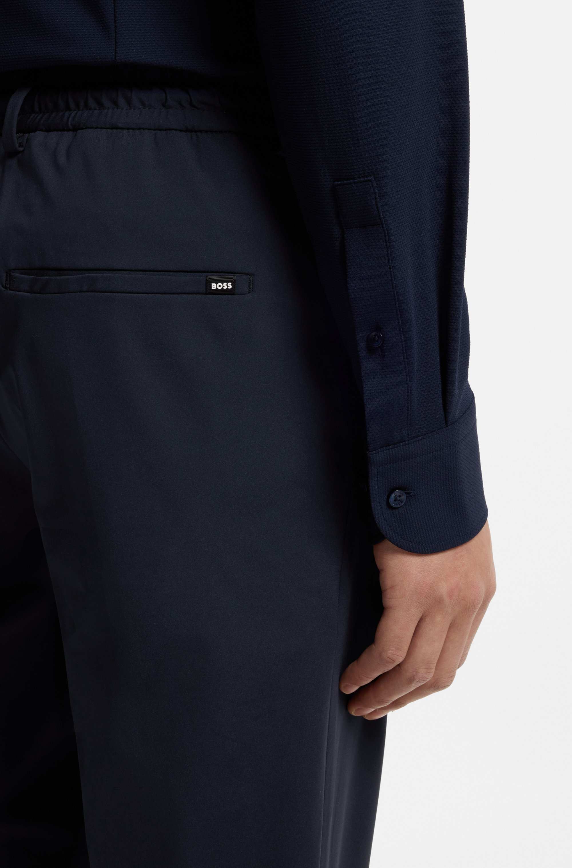 Dressletic slim-fit trousers in washable stretch jersey