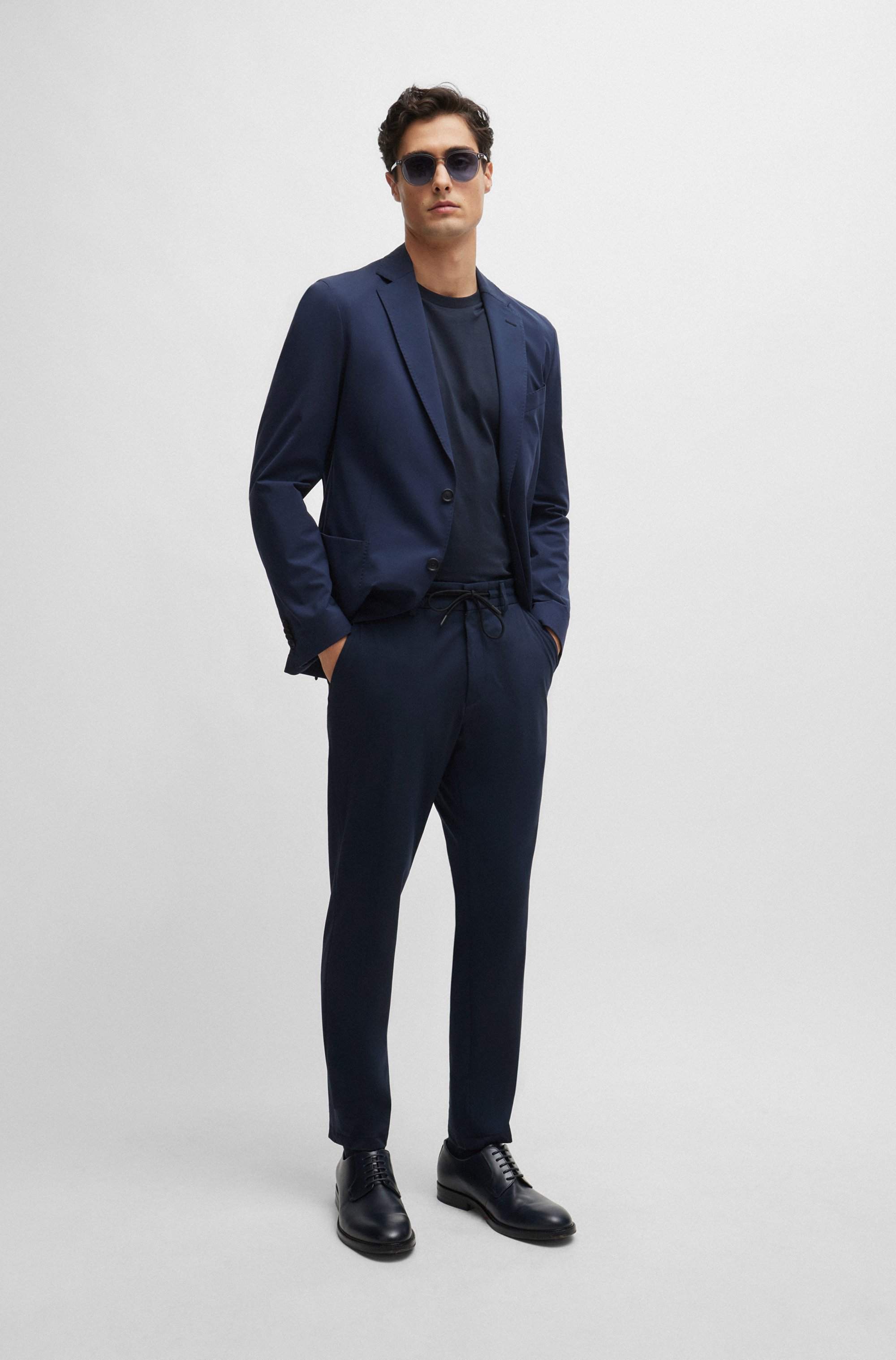 Slim-fit trousers in performance-stretch jersey