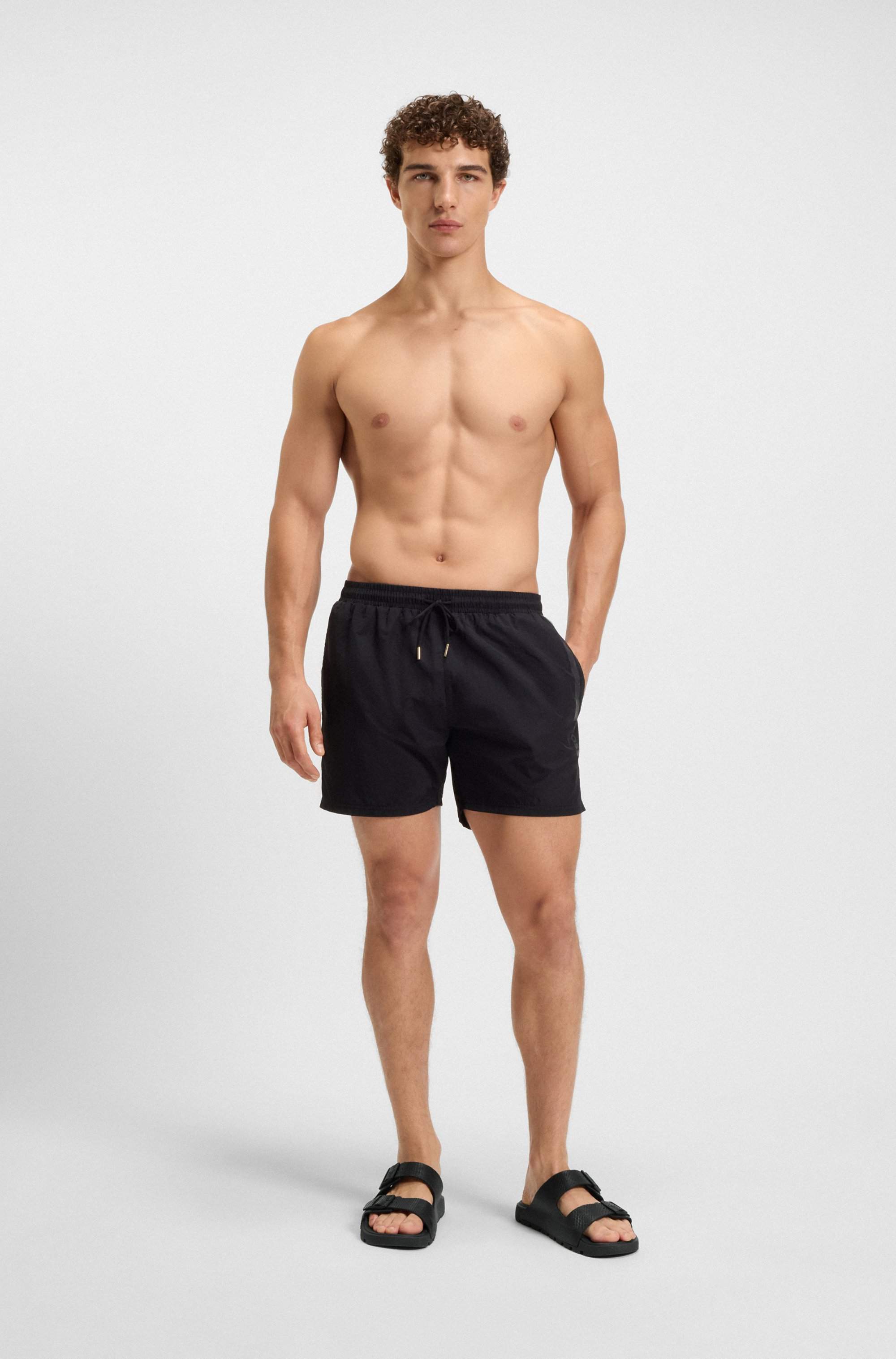 All-gender twin-strap sandals with structured uppers