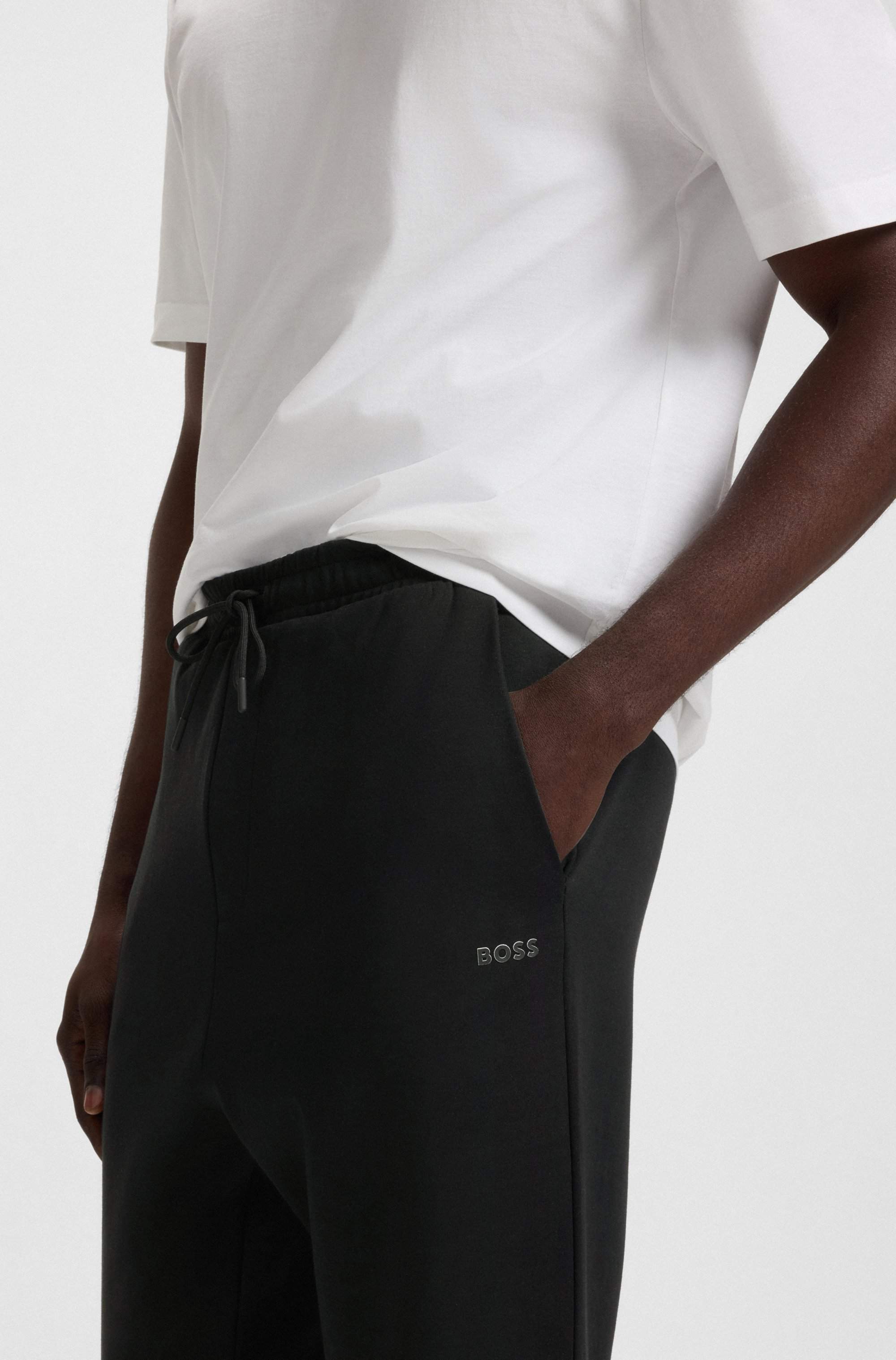 Stretch-cotton tracksuit bottoms with logo print