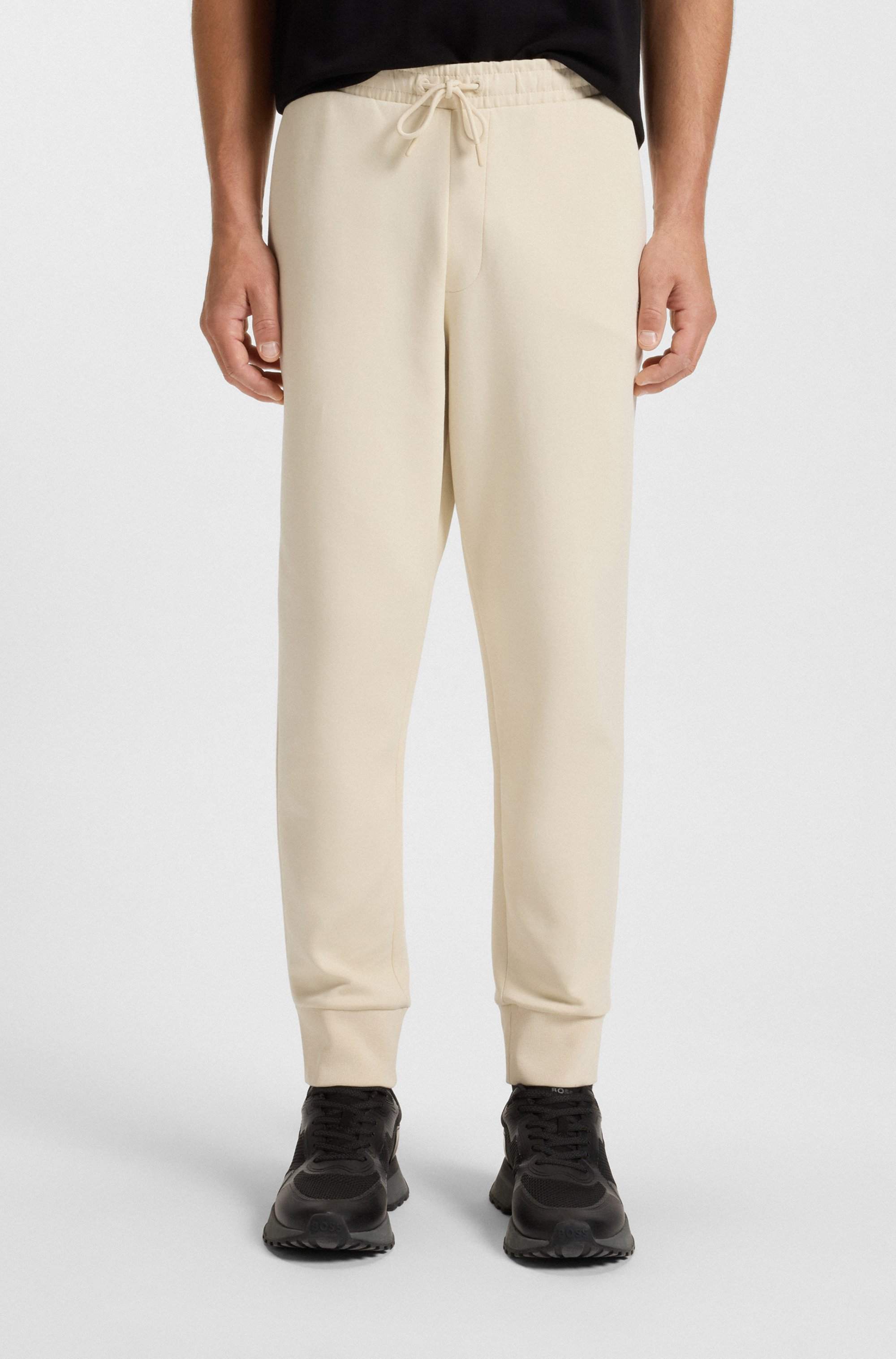 Stretch-cotton tracksuit bottoms with logo print