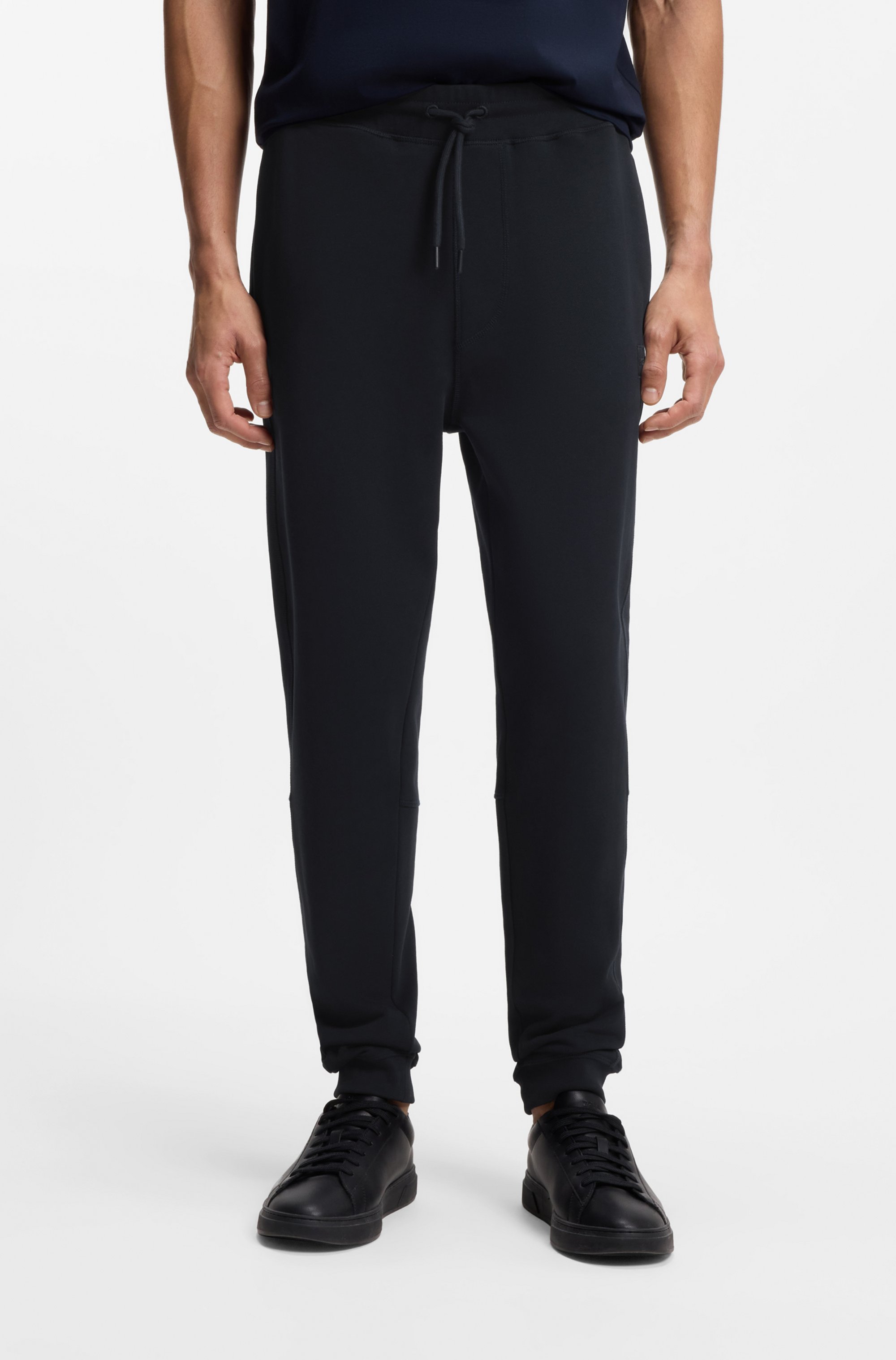 Cotton-terry tracksuit bottoms with logo patch