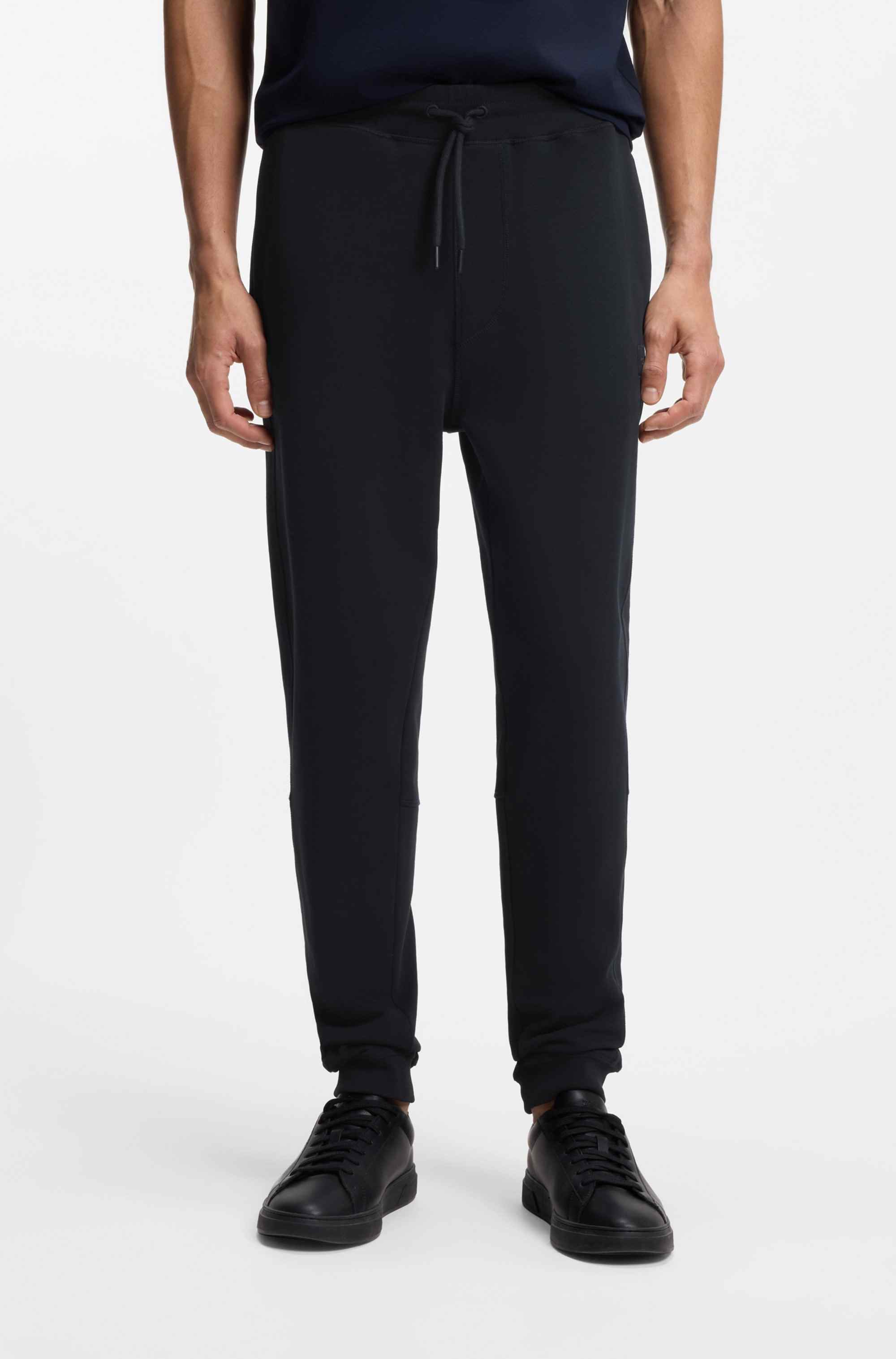 Cotton-terry tracksuit bottoms with logo patch