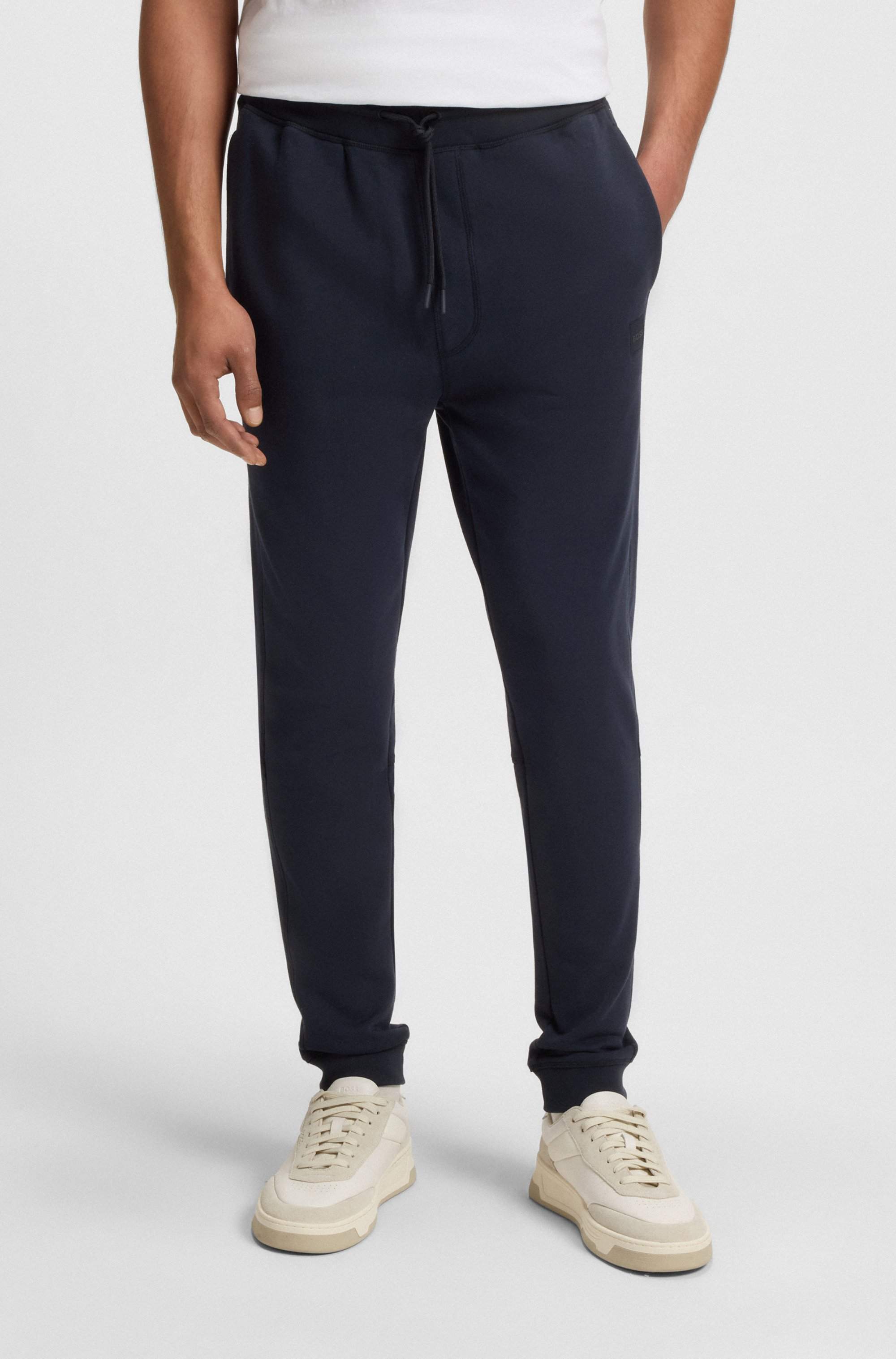 Cotton-terry tracksuit bottoms with logo patch