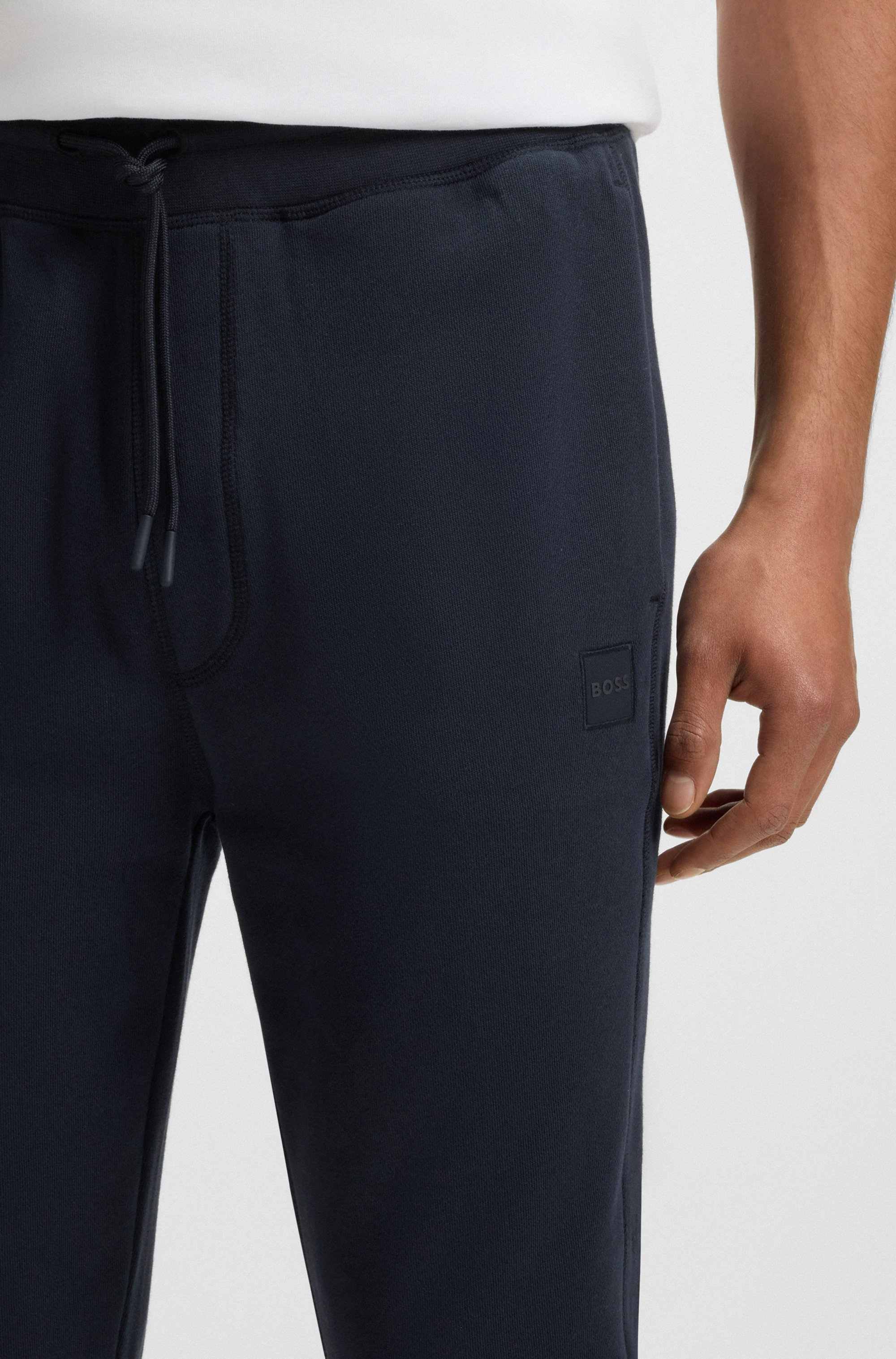 Cotton-terry tracksuit bottoms with logo patch