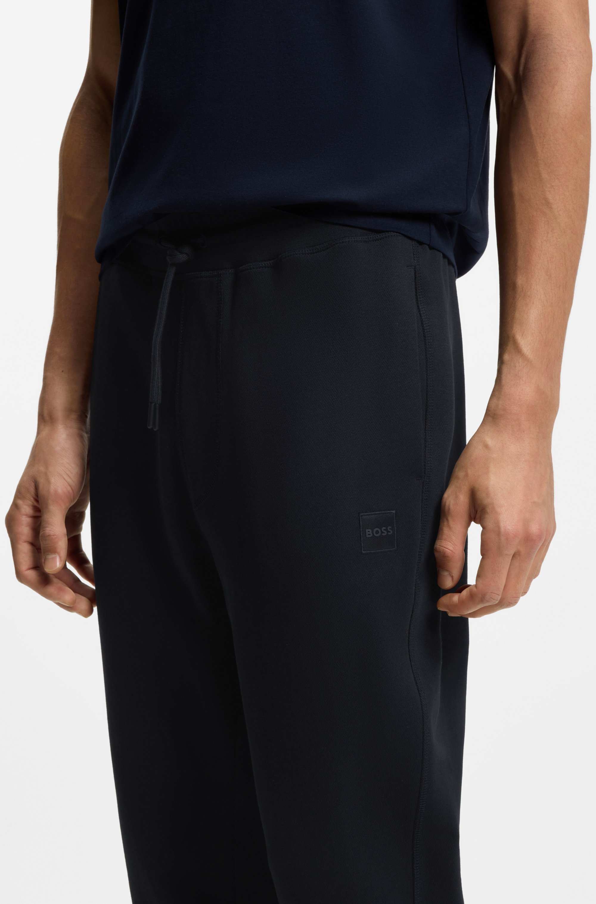 Cotton-terry tracksuit bottoms with logo patch