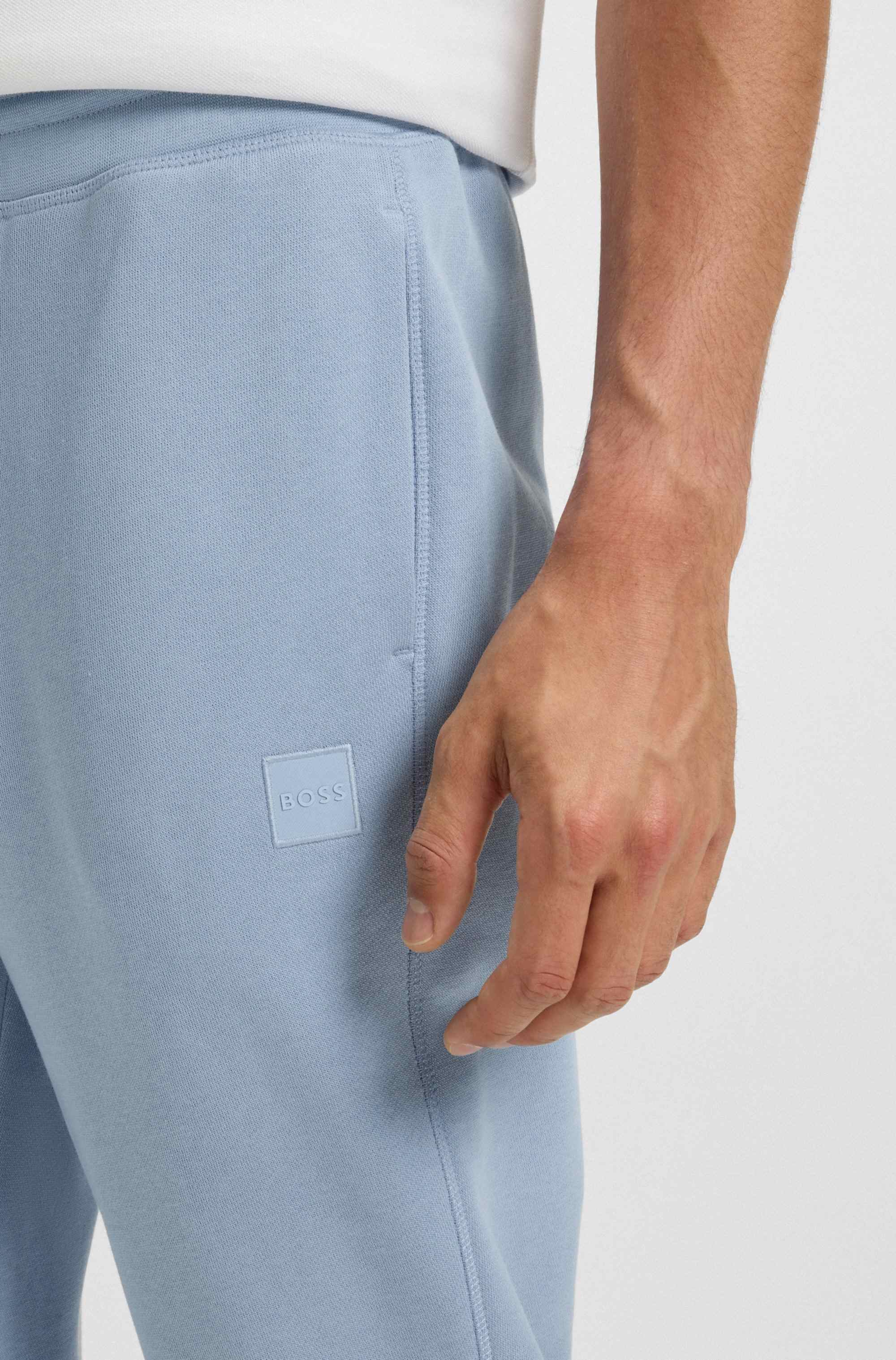 Cotton-terry tracksuit bottoms with logo patch