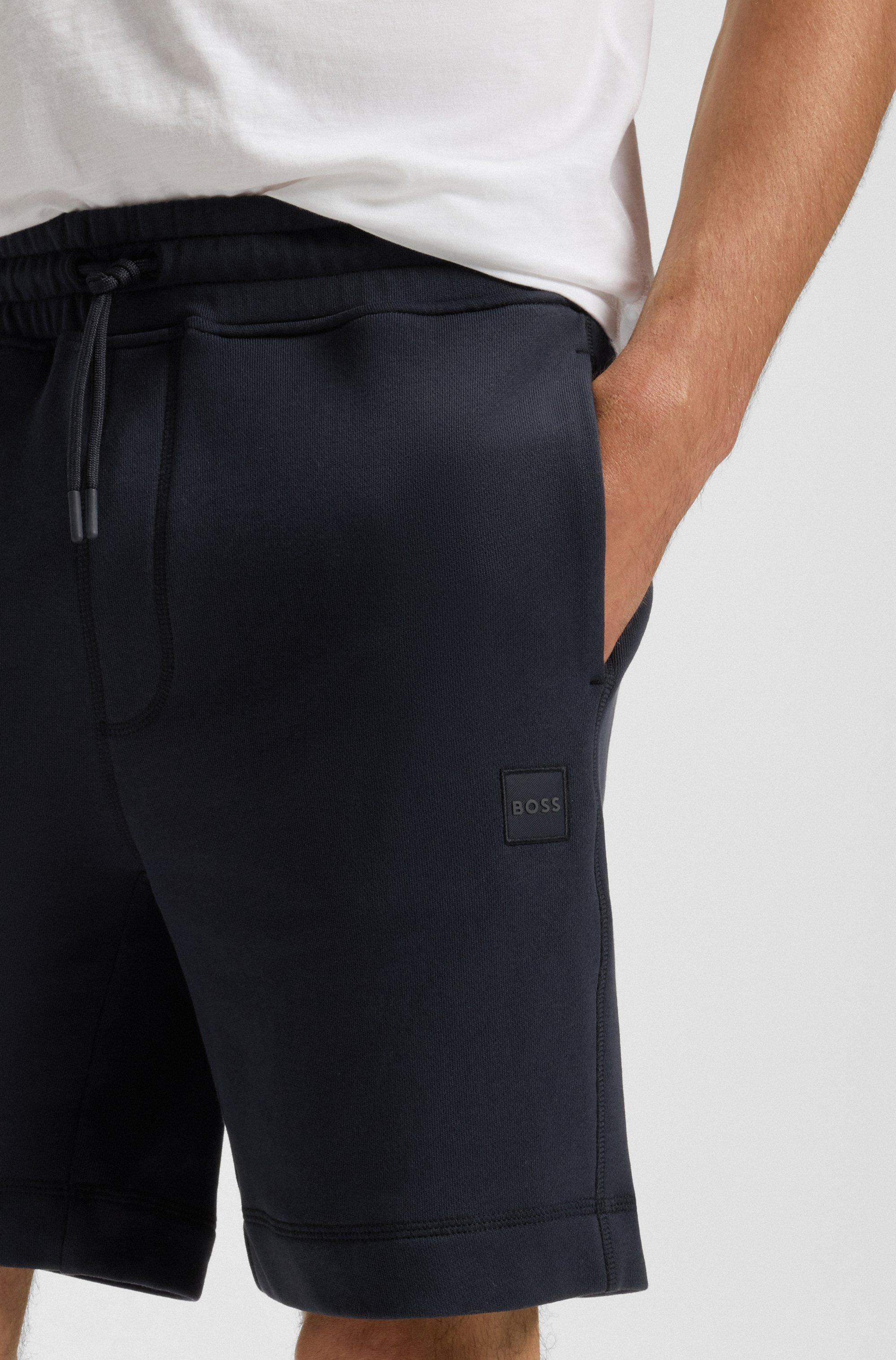 Drawstring shorts in cotton terry with logo badge