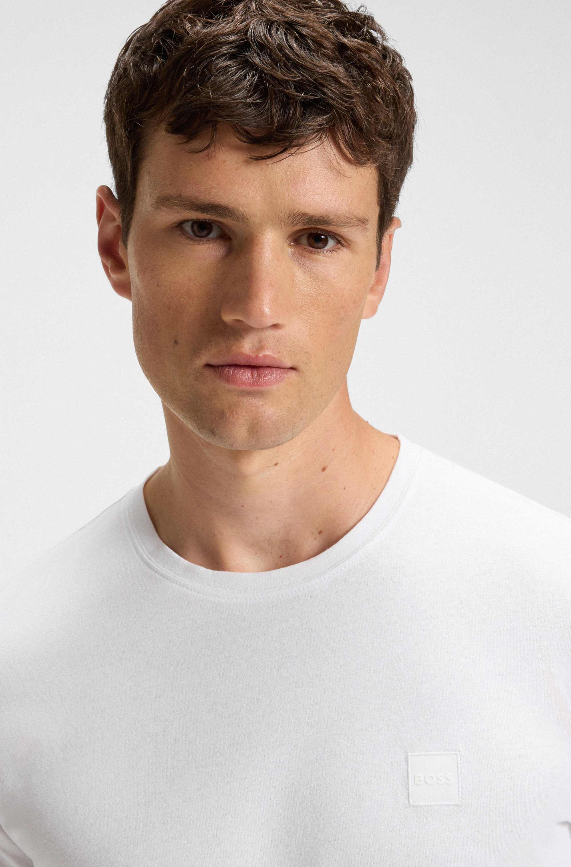 Long-sleeved T-shirt in cotton with woven logo patch