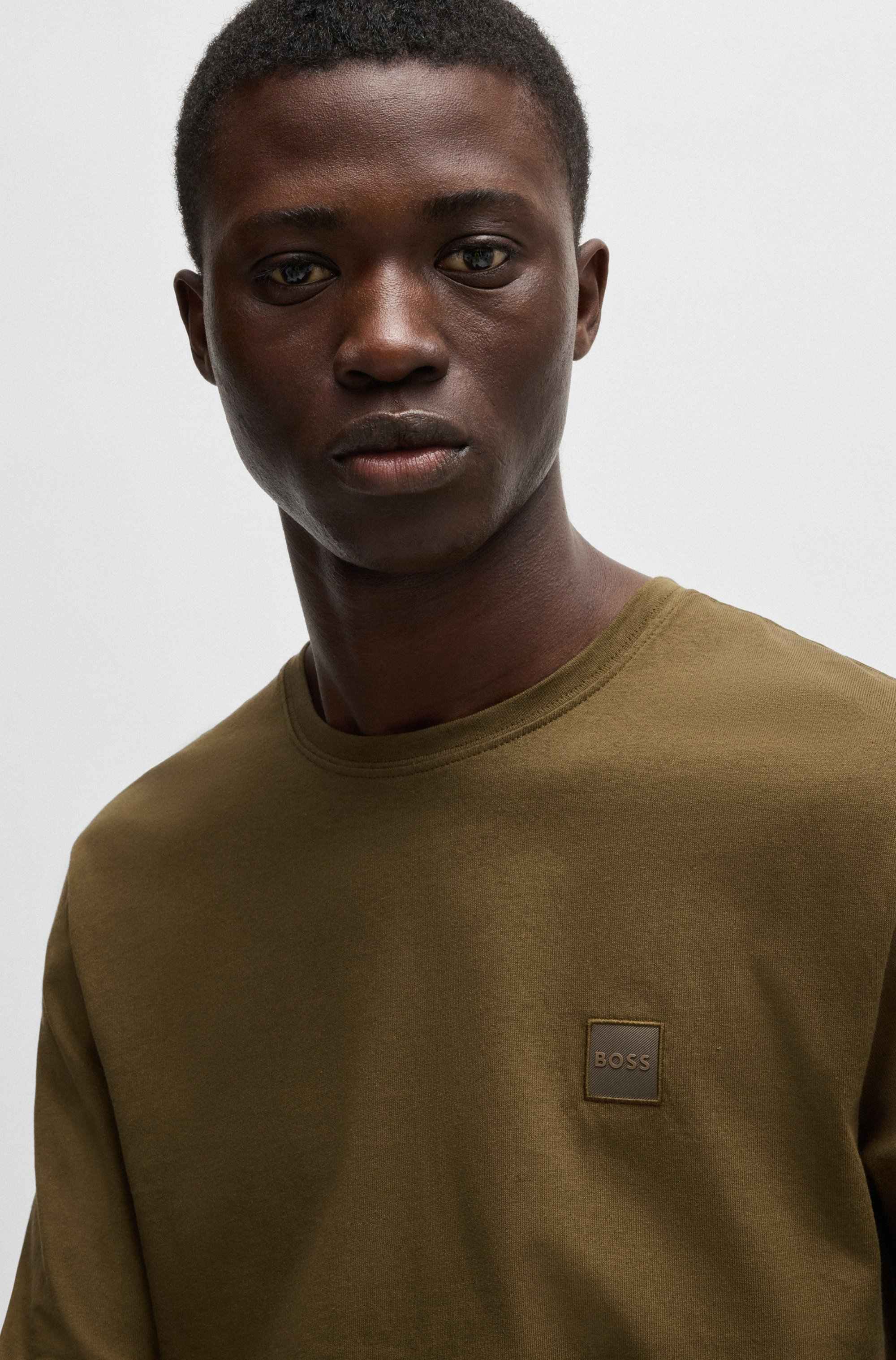 Long-sleeved T-shirt in cotton with woven logo patch