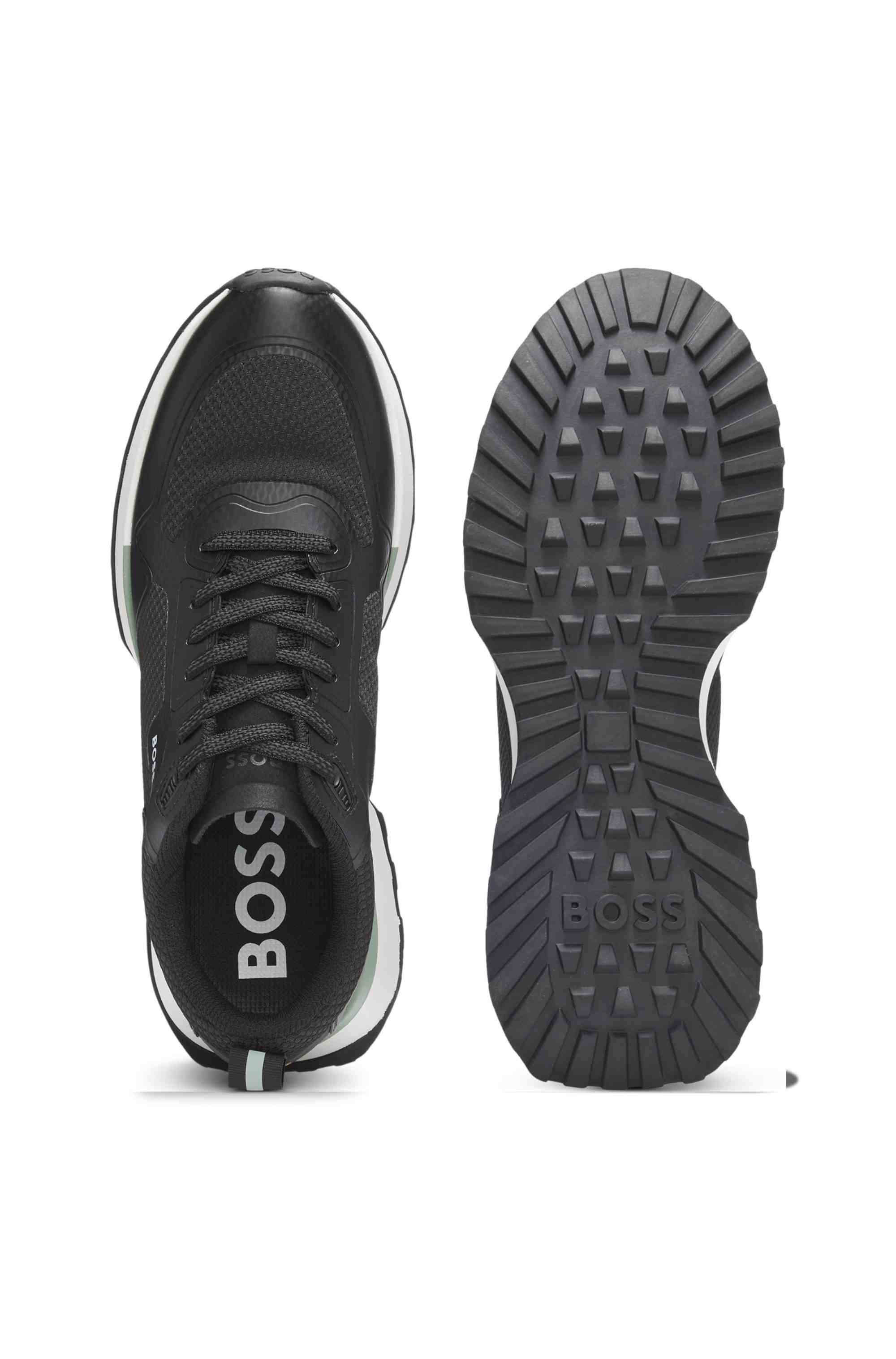 Mixed-material trainers with mesh details and branding