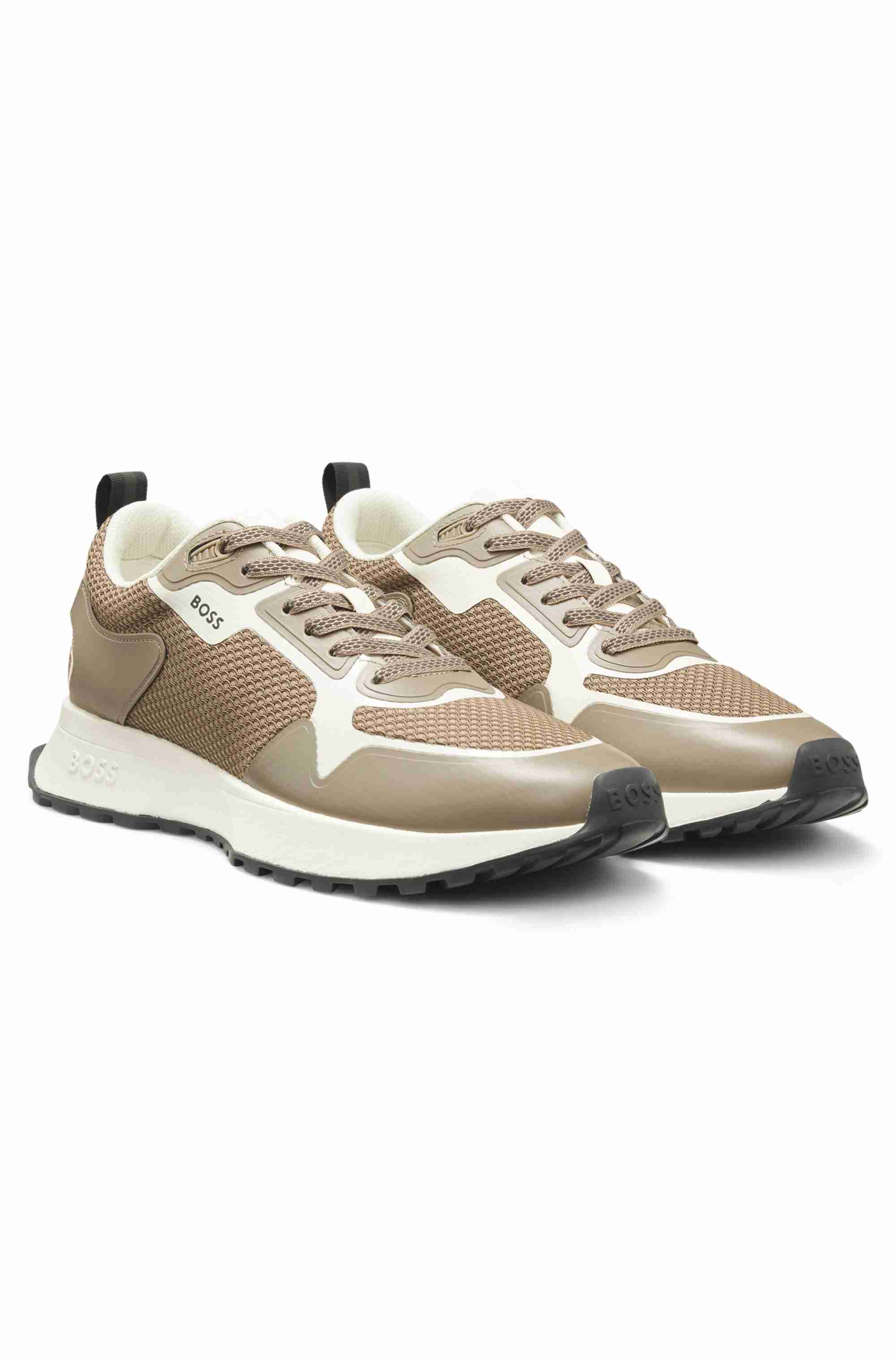 Mixed-material trainers with mesh details and branding
