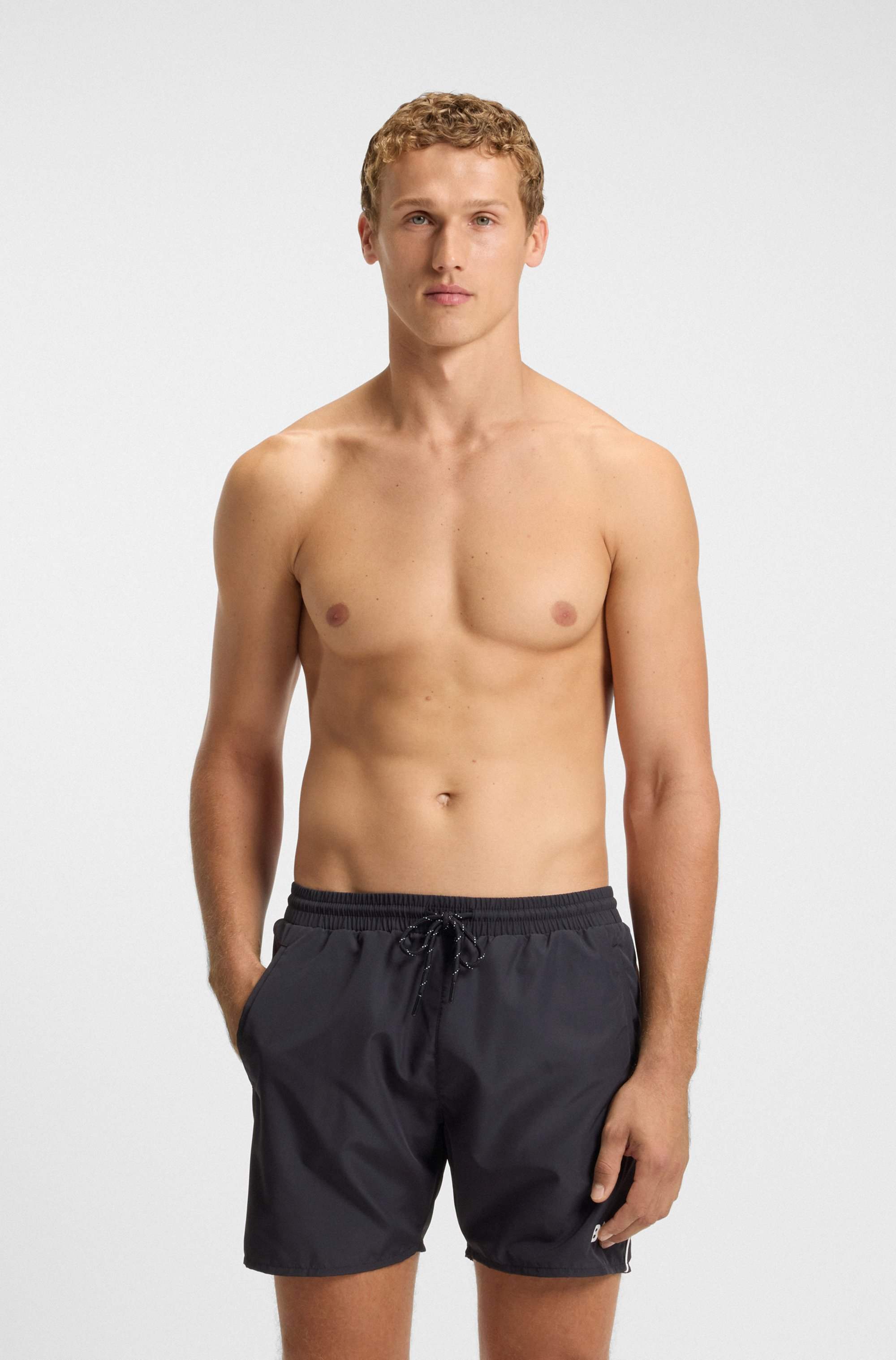 Swim shorts with contrast logo