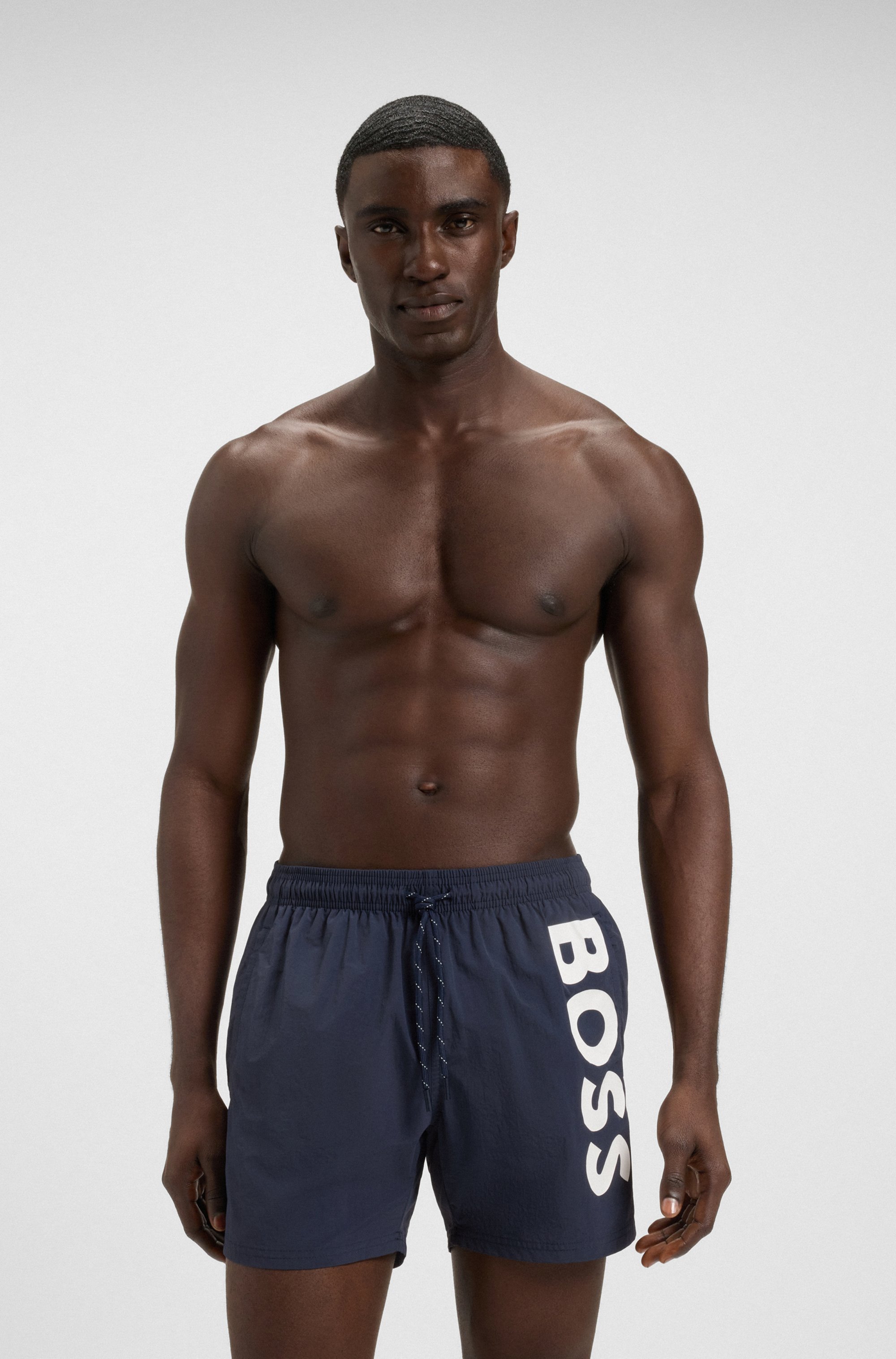 Quick-dry swim shorts with vertical logo print