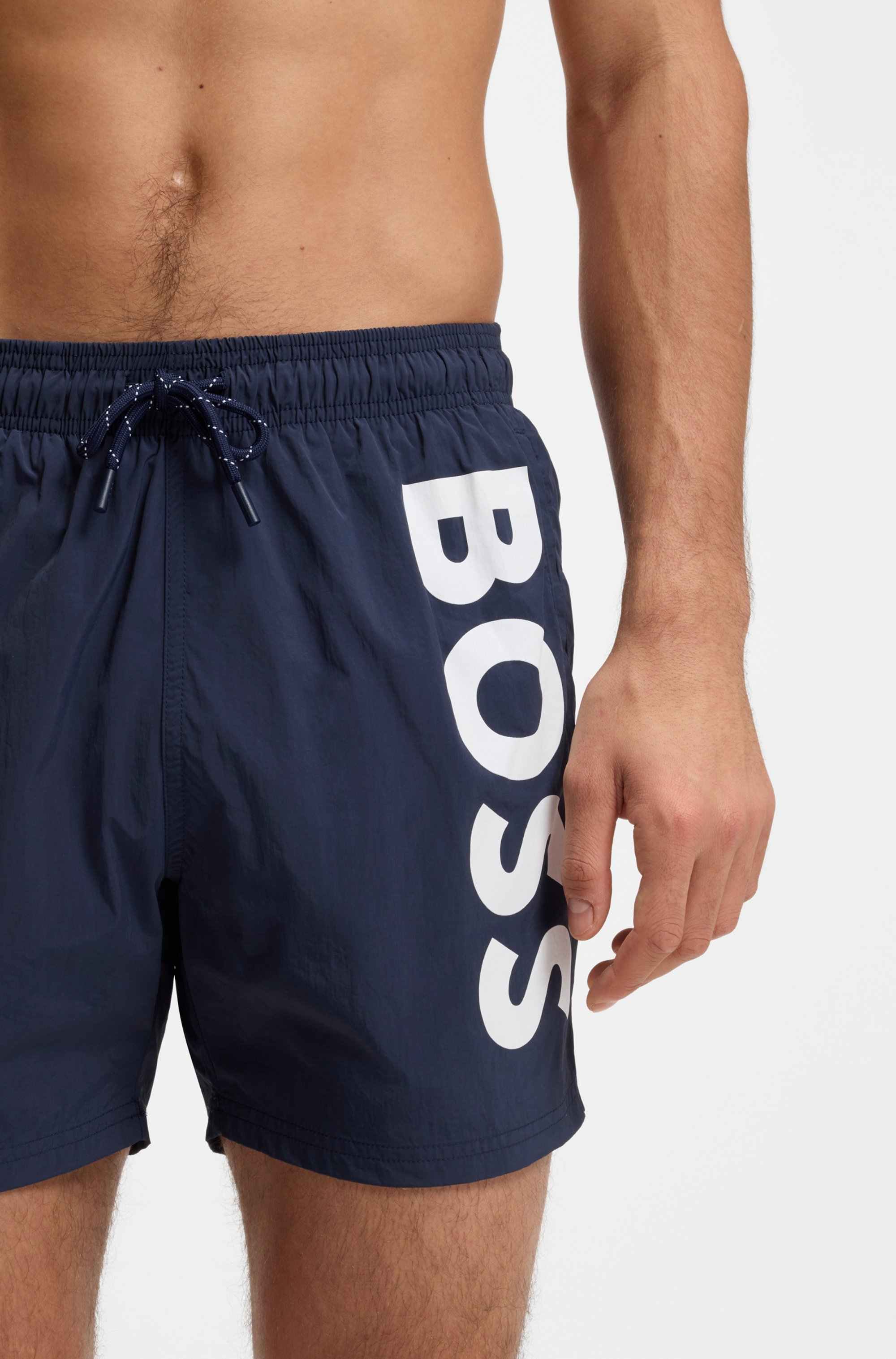 Quick-dry swim shorts with vertical logo print