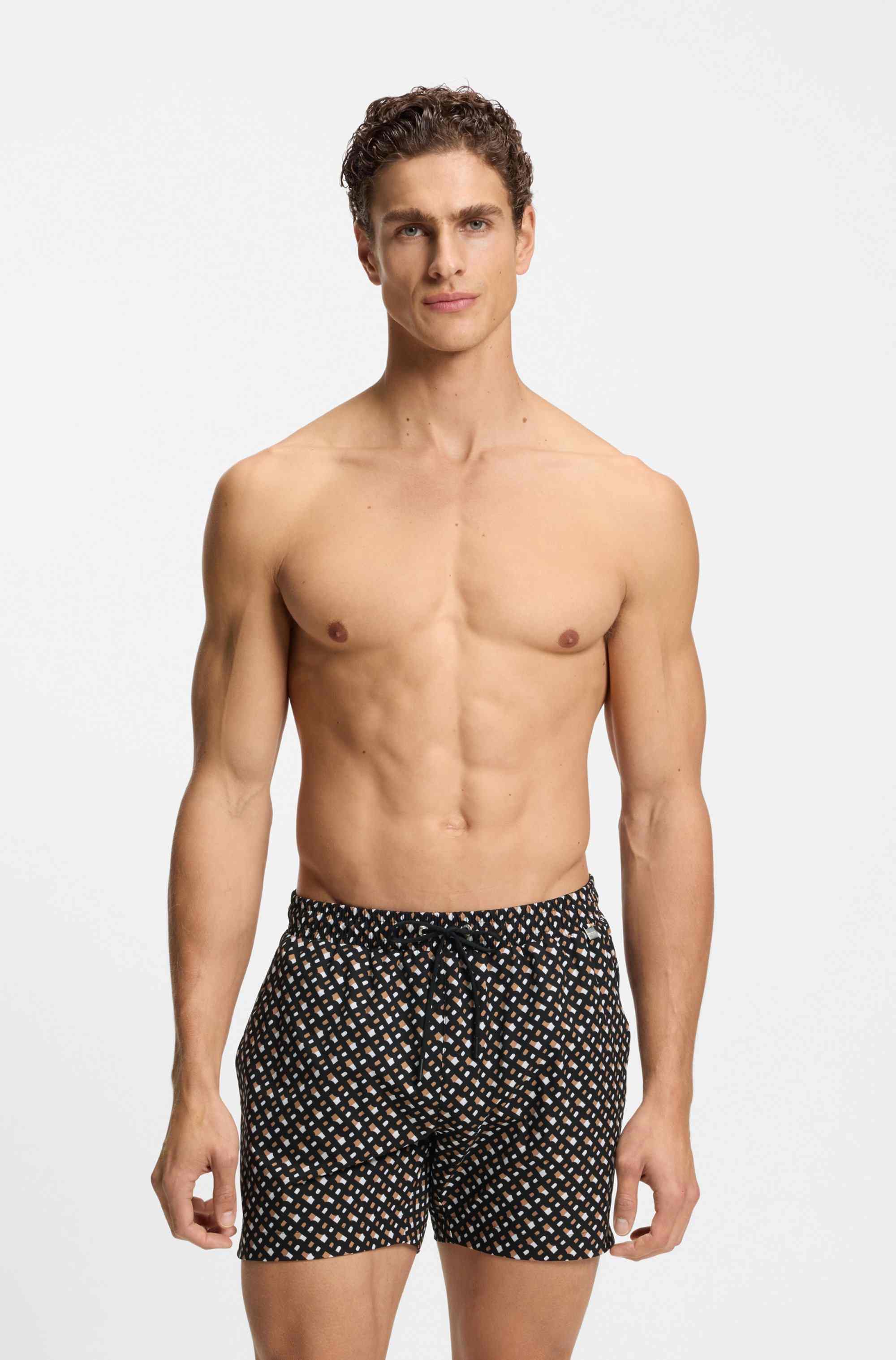Fully lined quick-dry swim shorts with monogram print