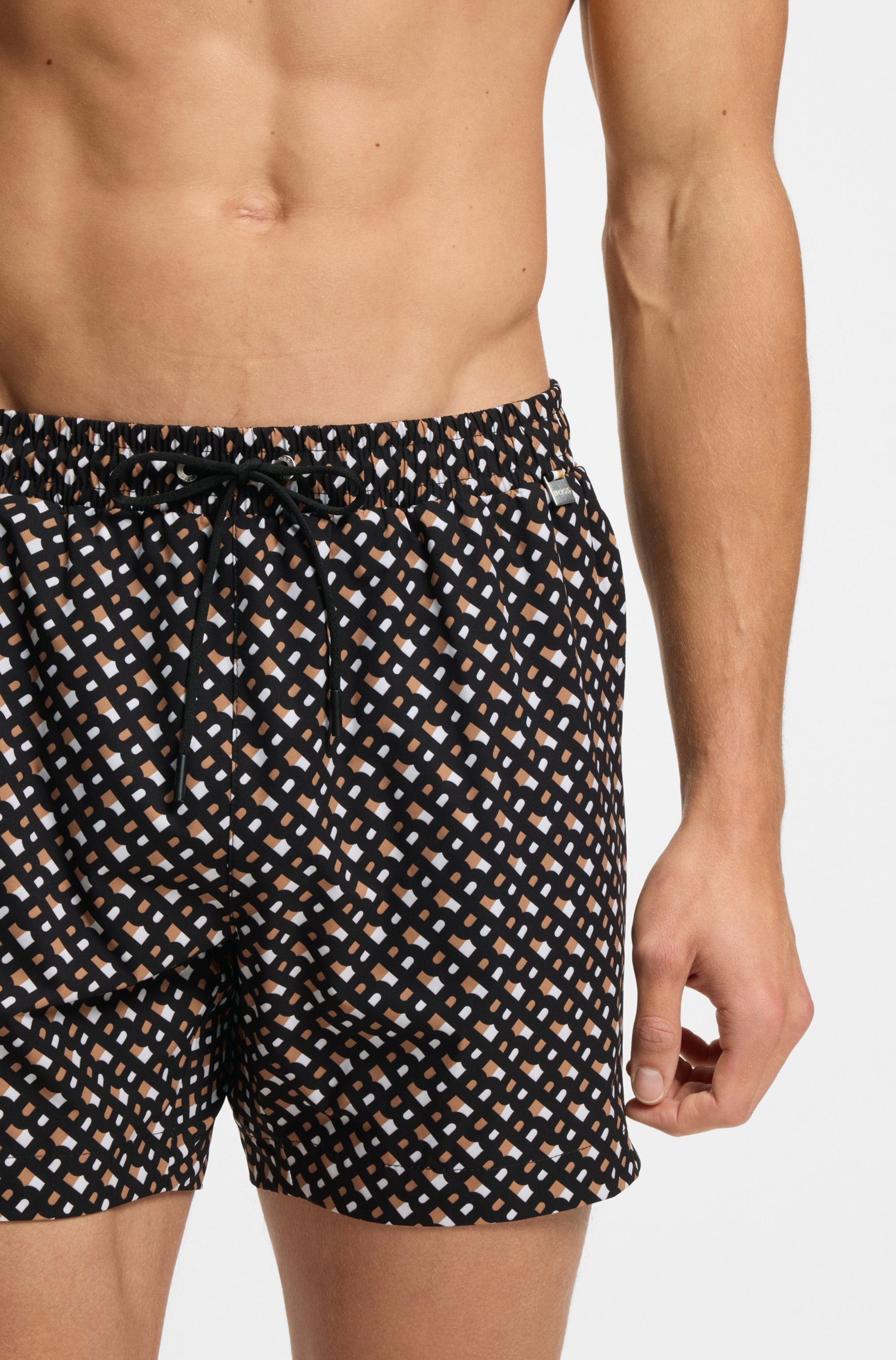 Fully lined quick-dry swim shorts with monogram print