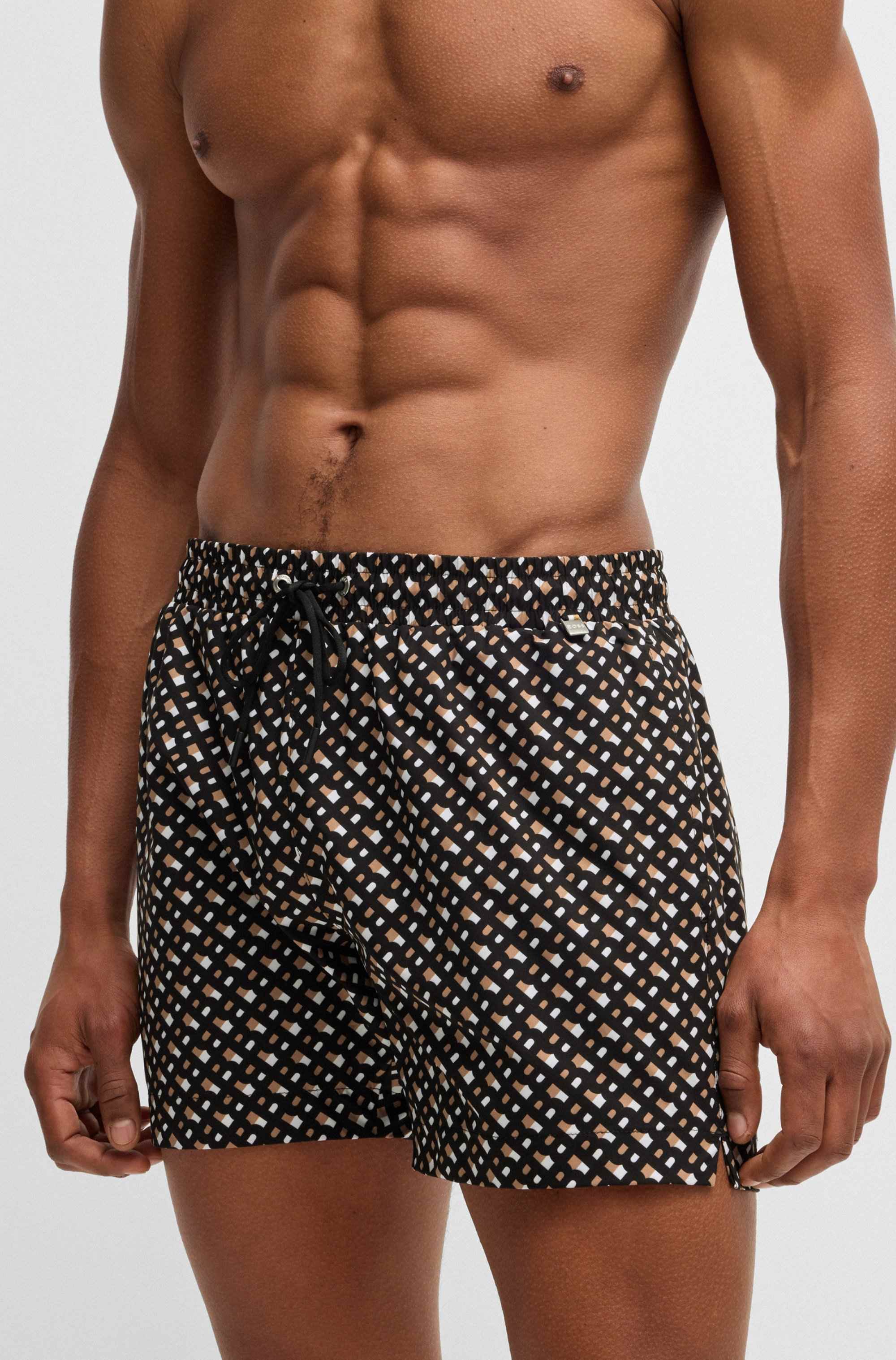 Fully lined quick-dry swim shorts with monogram print