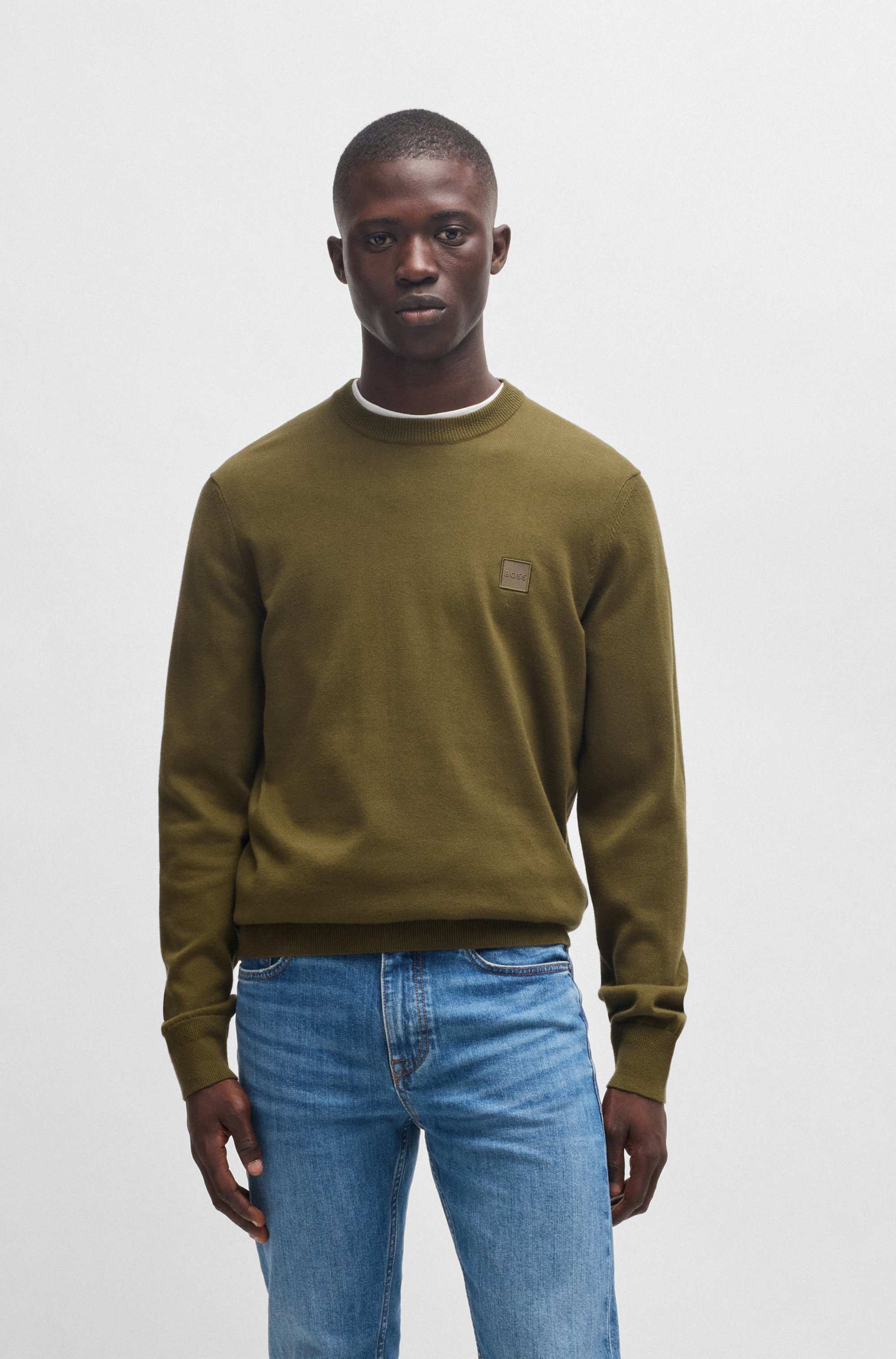 Knitted sweater in cotton and cashmere with logo label