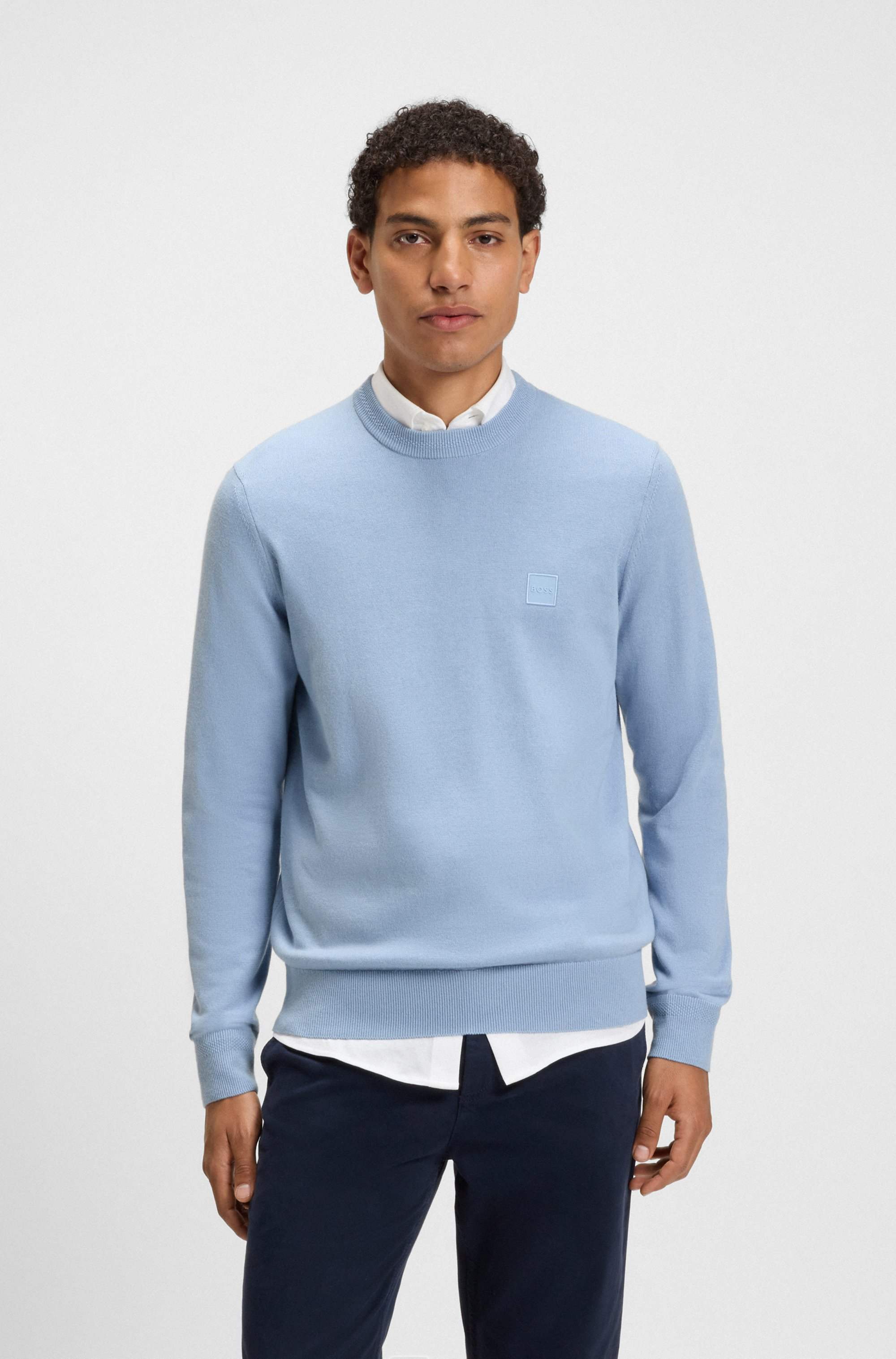 Knitted sweater in cotton and cashmere with logo label