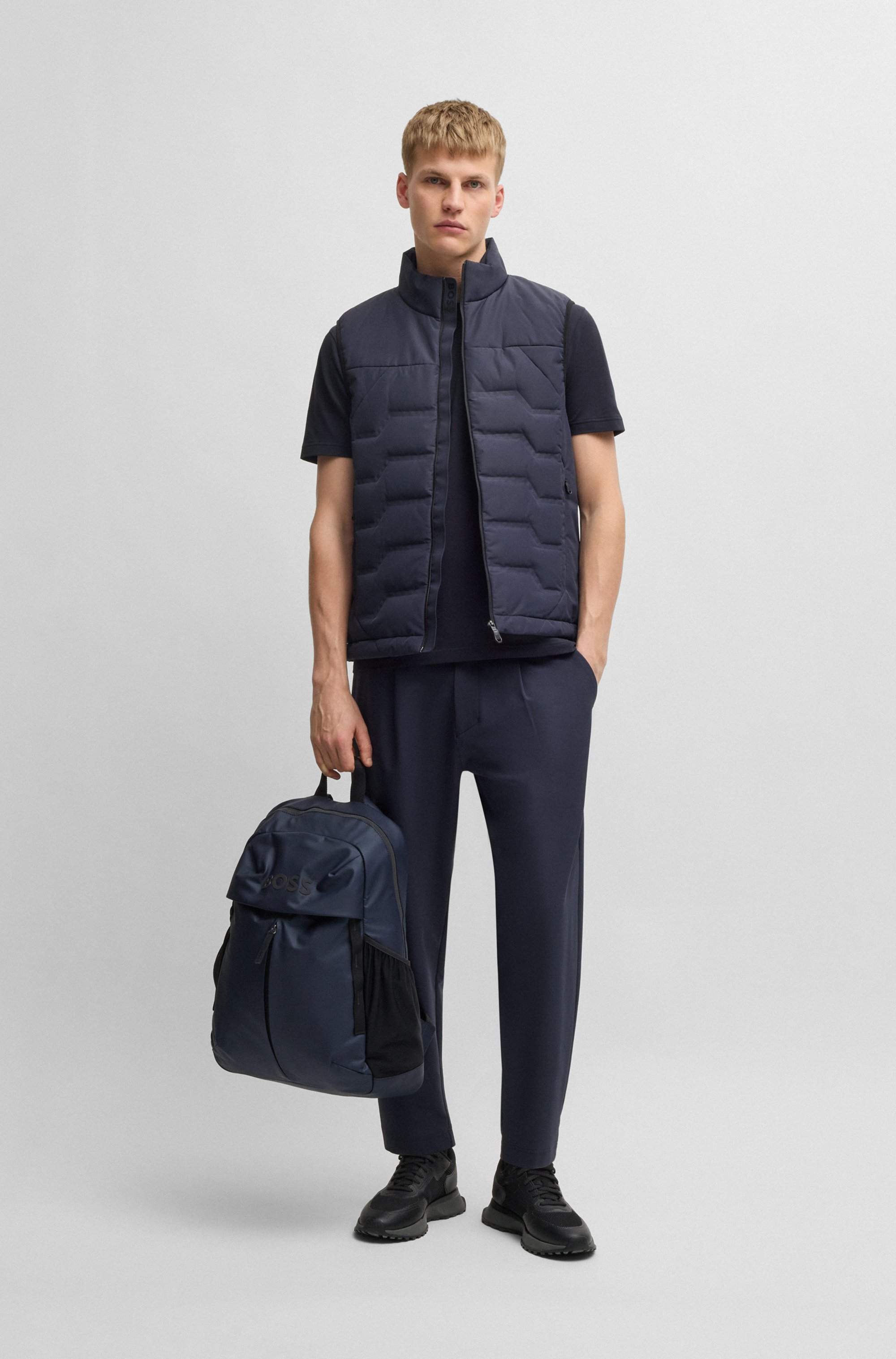 Water-repellent gilet with adjustable hem