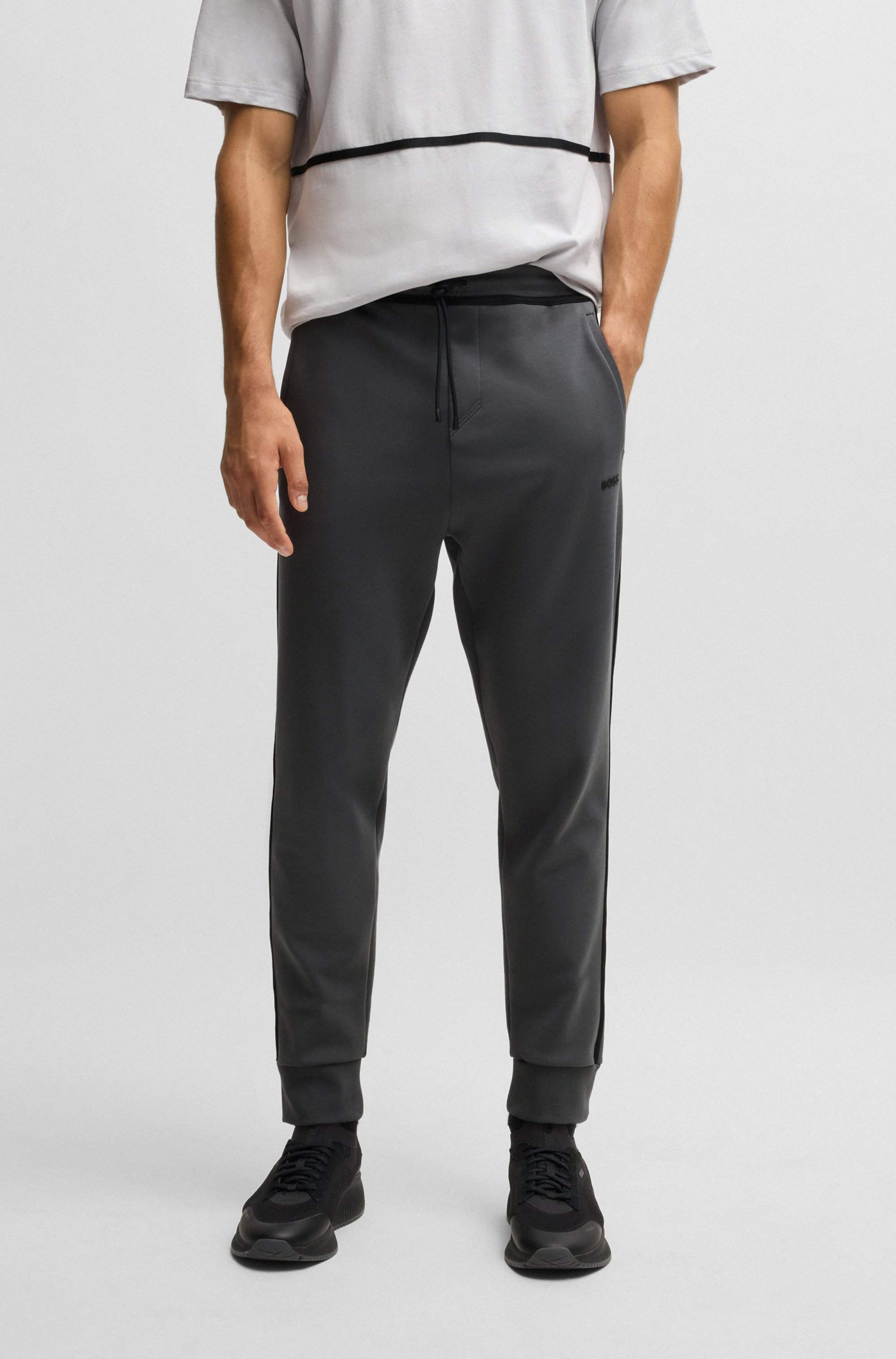 Cotton-blend tracksuit bottoms with tape and logo
