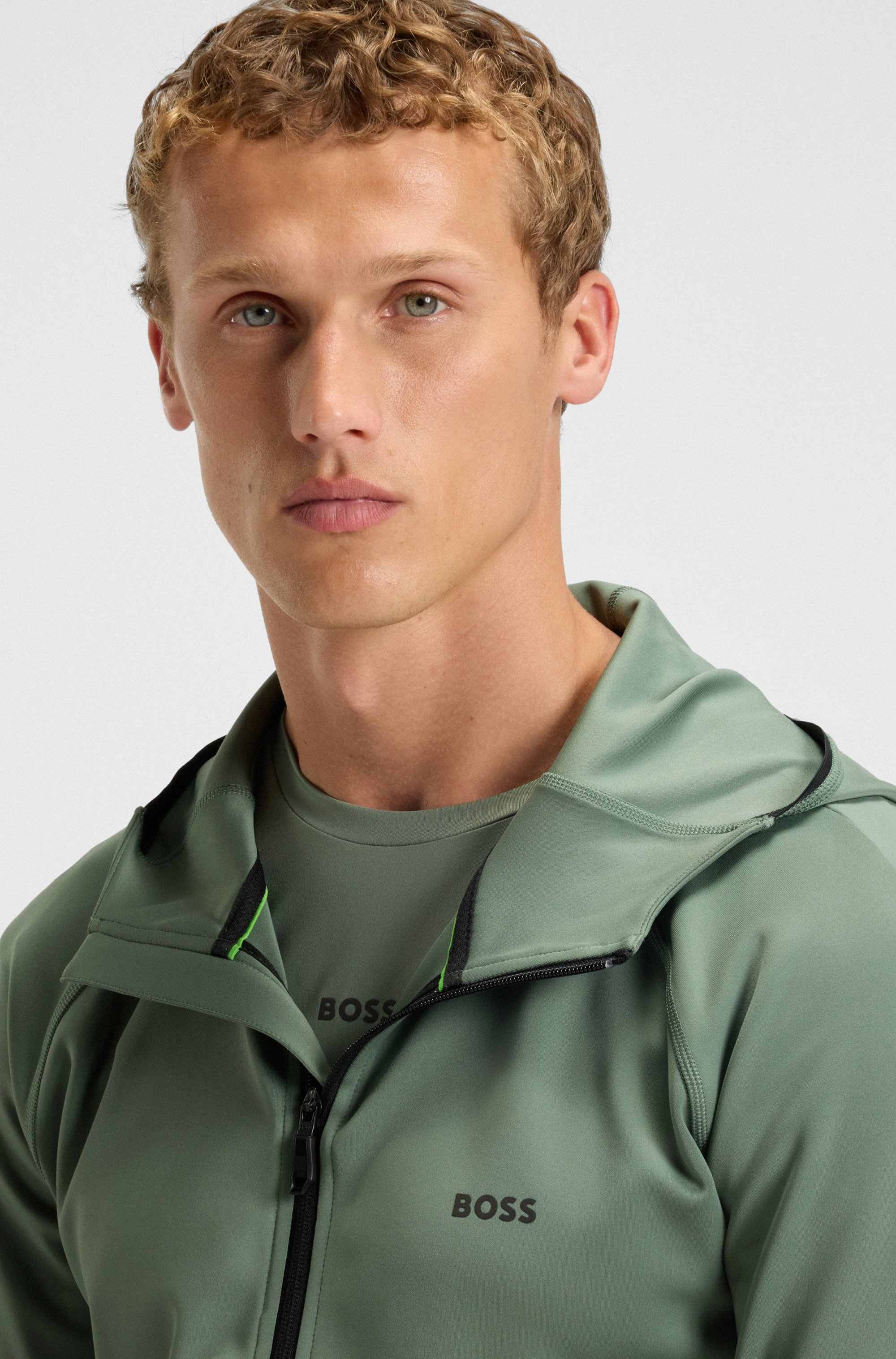 Zip-up hoodie with reflective branding