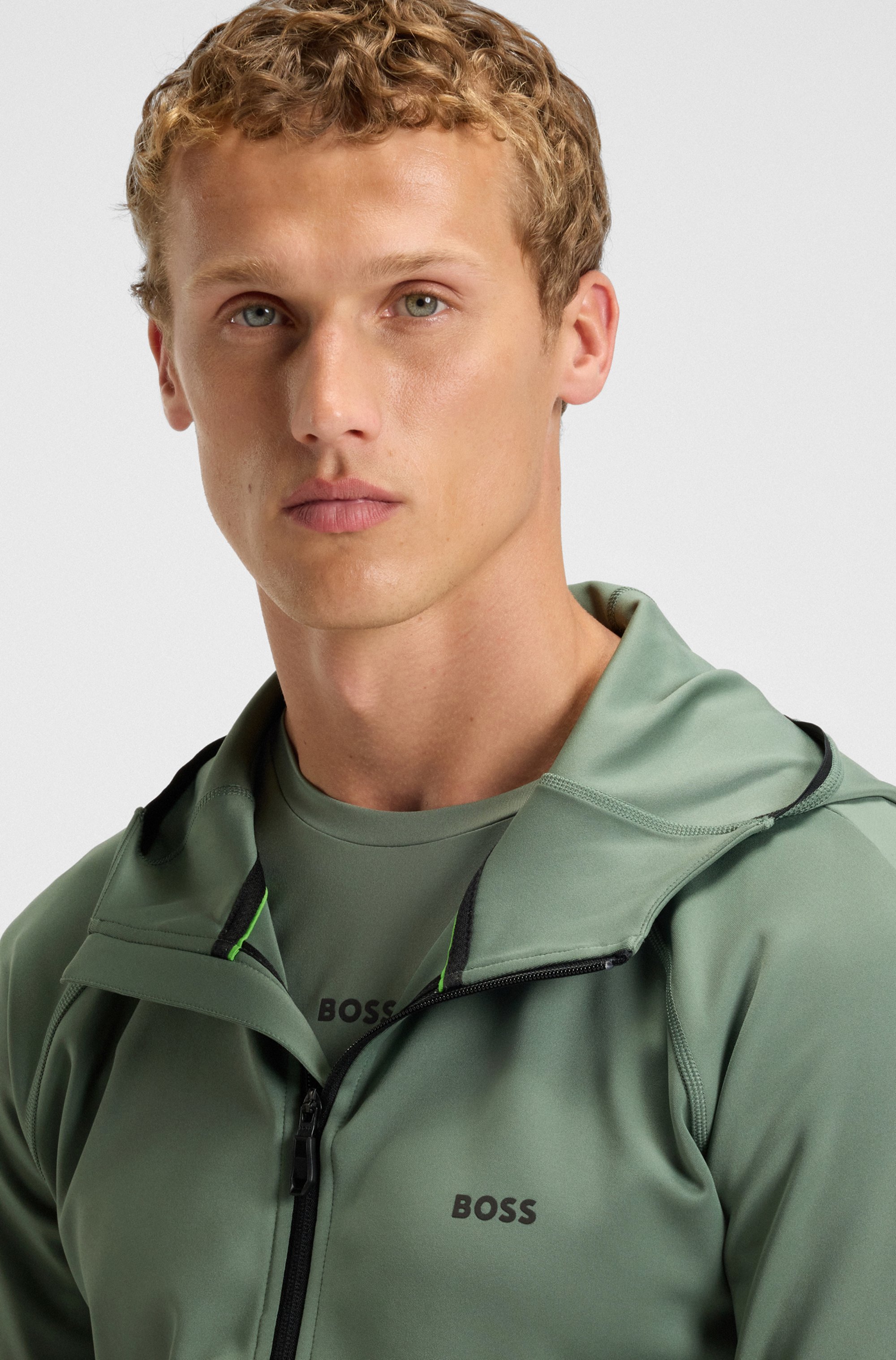 Zip-up hoodie with reflective branding