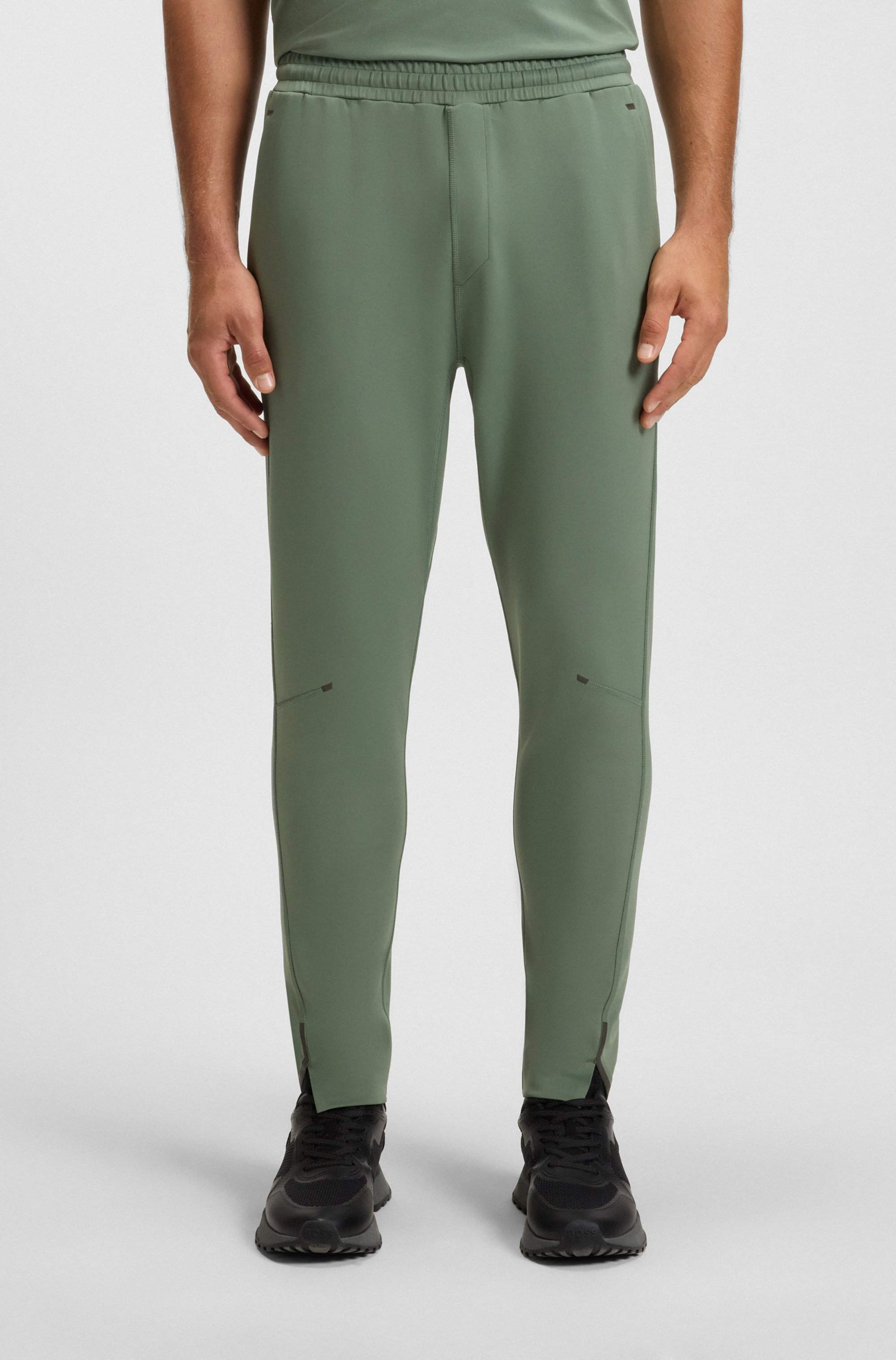 Quick-dry trousers with reflective branding