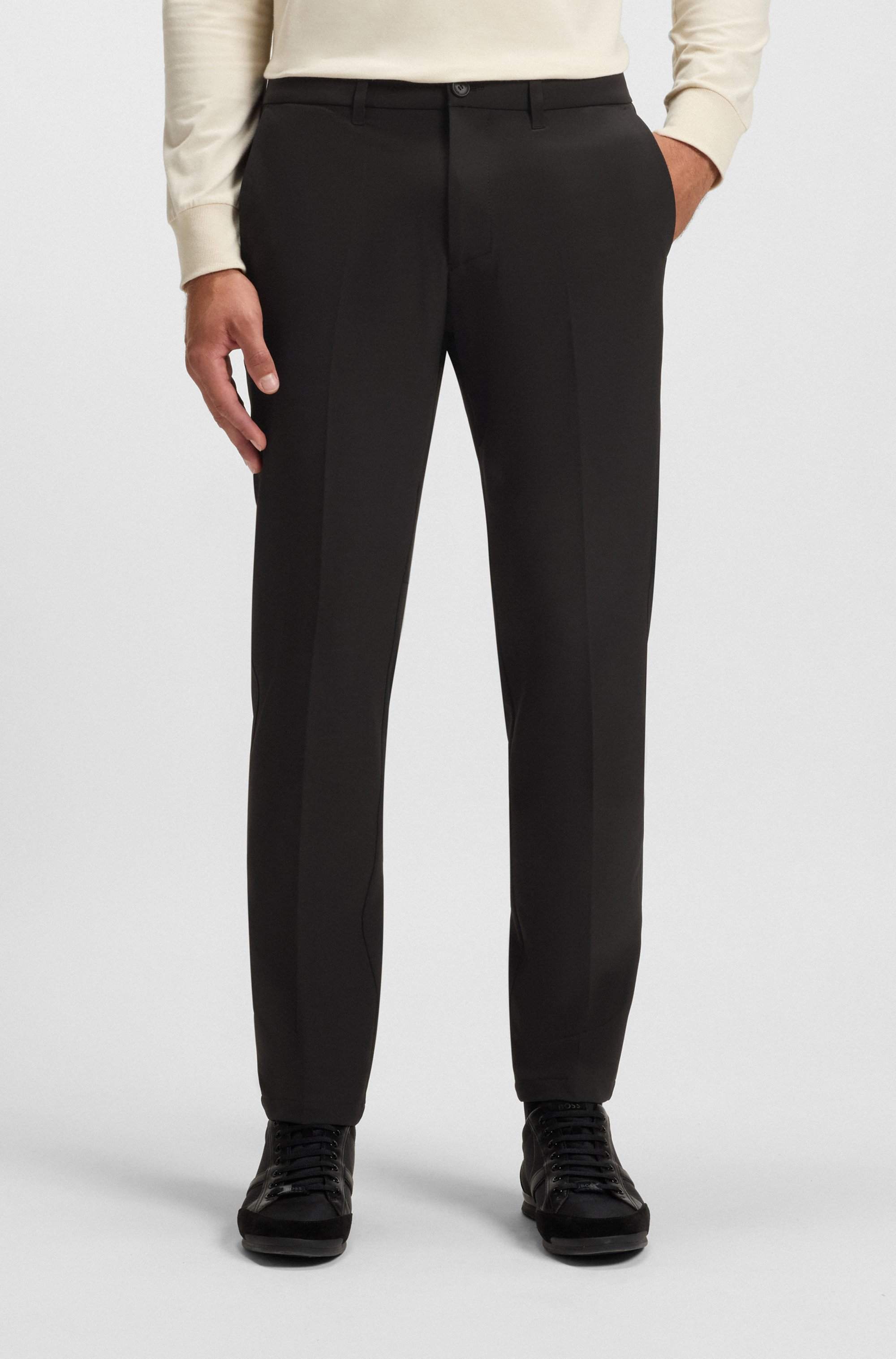Slim-fit trousers in water-repellent stretch fabric