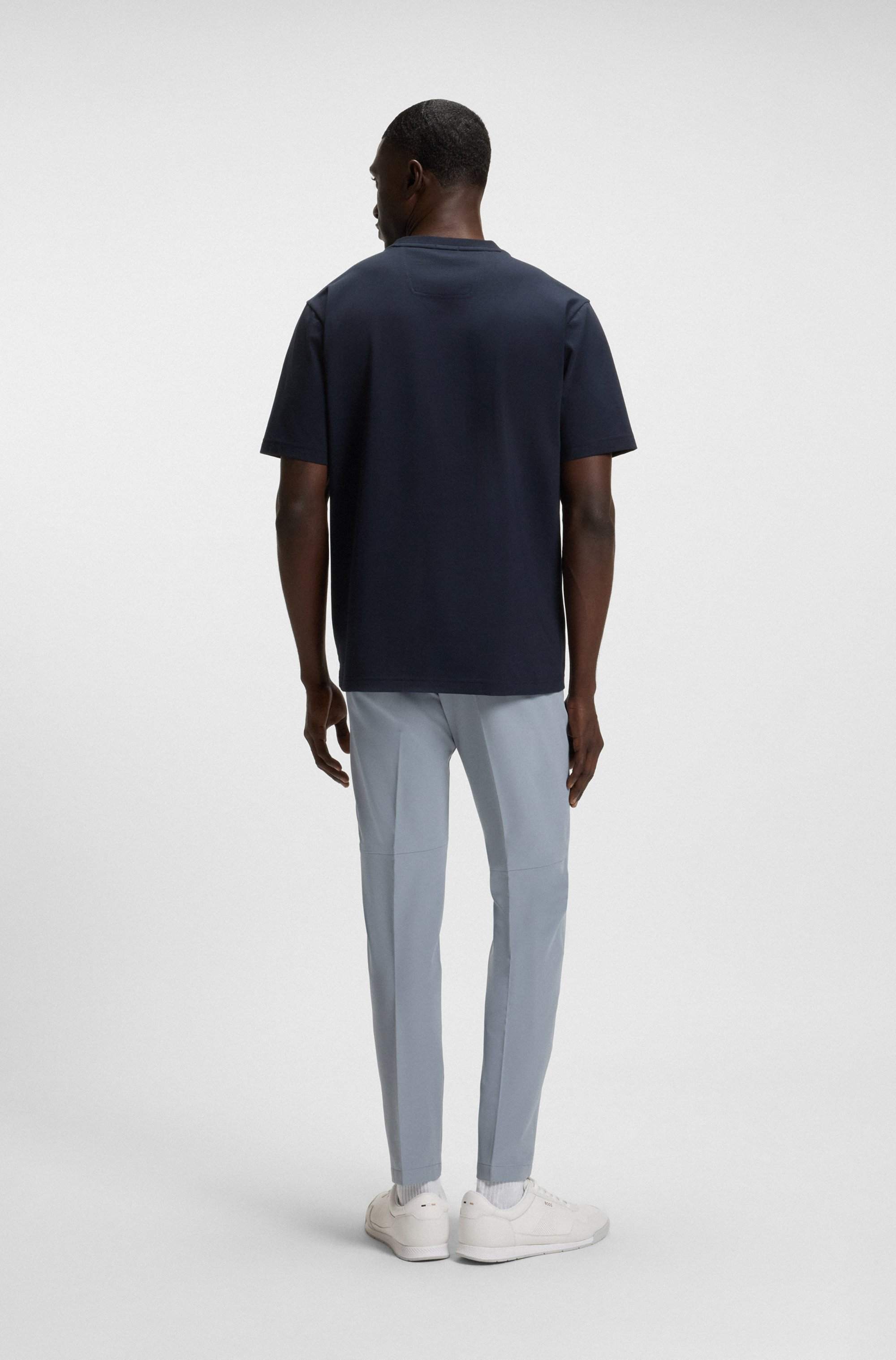 Slim-fit trousers in water-repellent stretch fabric