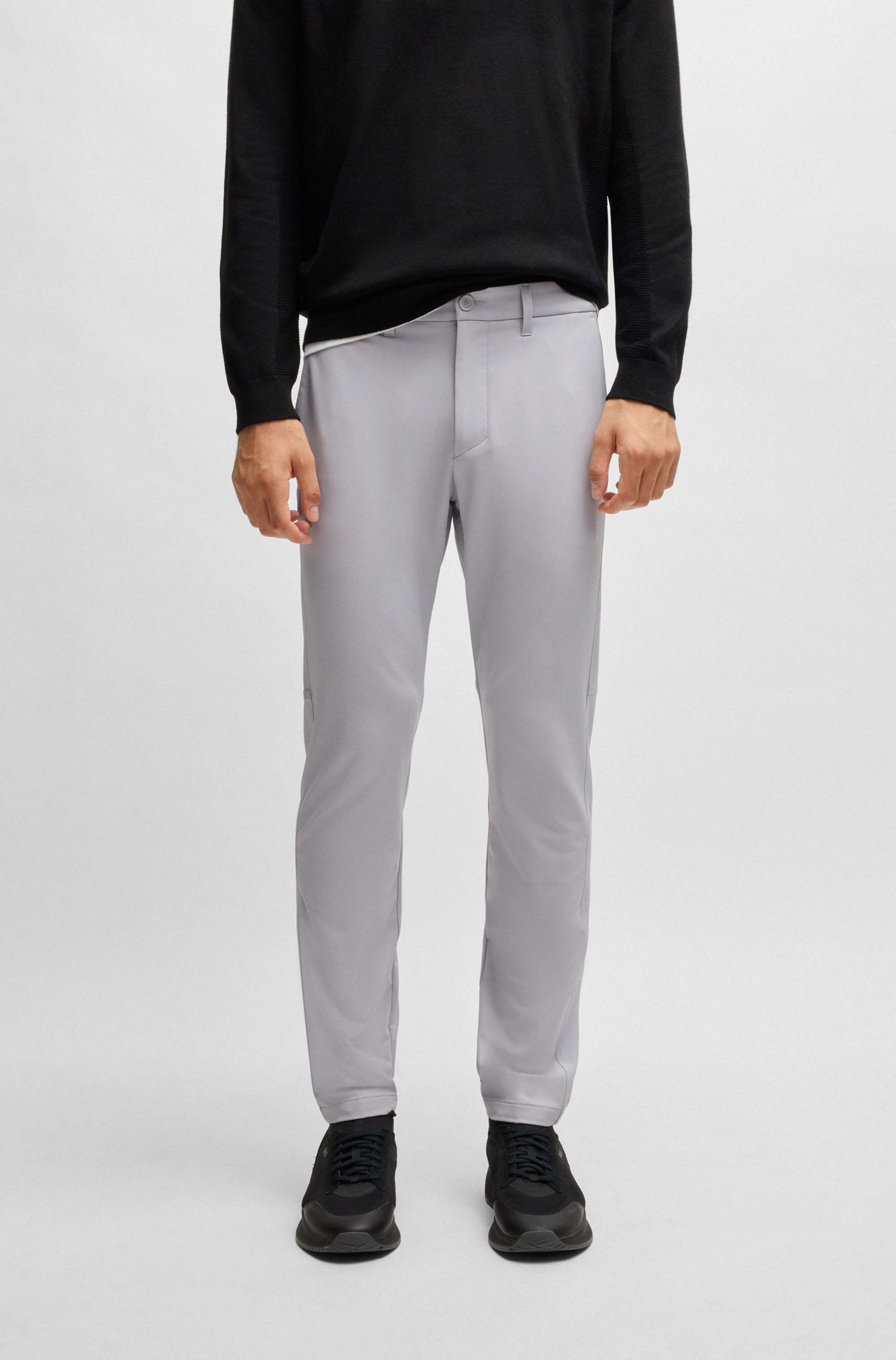 Slim-fit trousers in water-repellent stretch fabric