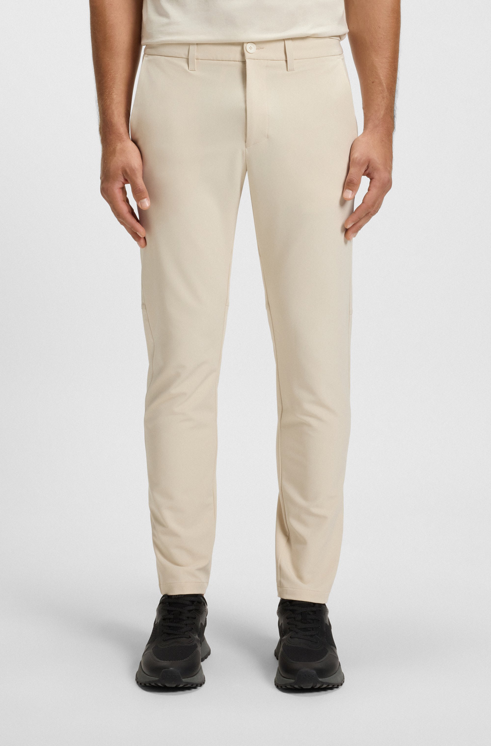 Slim-fit trousers in water-repellent stretch fabric